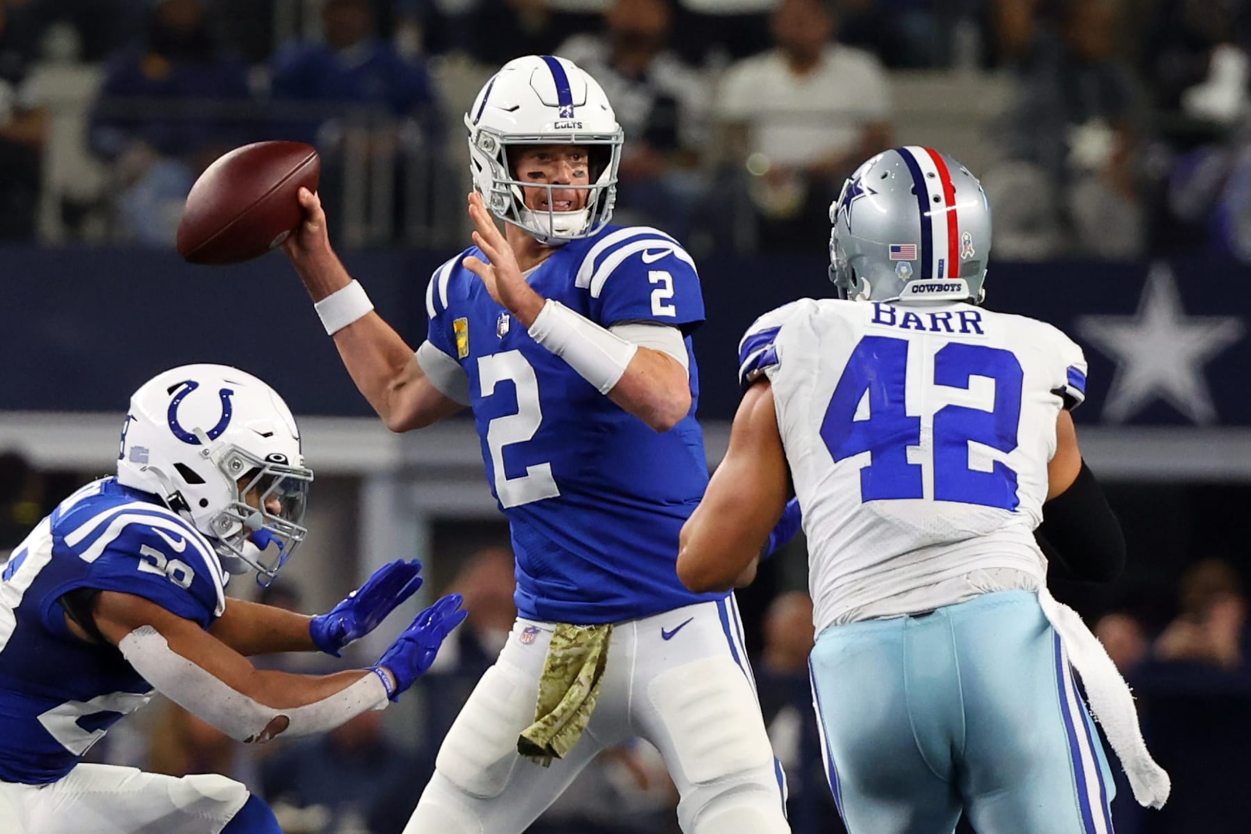 ARLINGTON, TEXAS - DECEMBER 04: Matt Ryan #2 of the Indianapolis Colts passes the ball against the Dallas Cowboys at AT&T Stadium on December 04, 2022 in Arlington, Texas. (Photo by Richard Rodriguez/Getty Images)