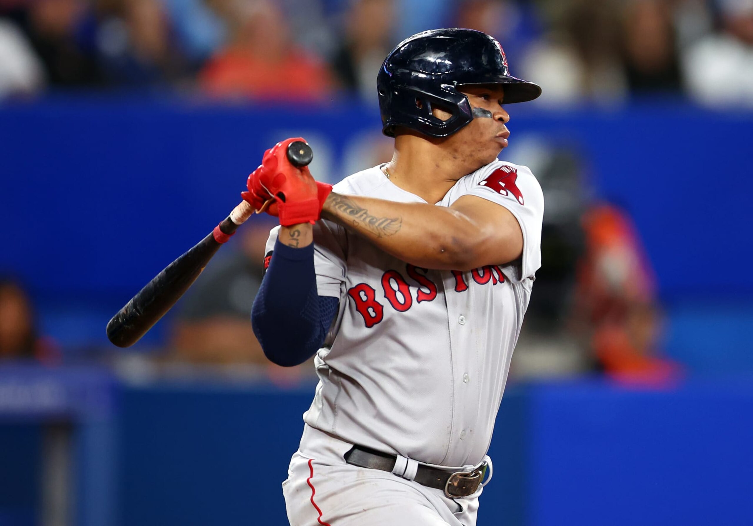 TORONTO, ON - SEPTEMBER 30:  Rafael Devers #11 of the Boston Red Sox bats against the Toronto Blue Jays at Rogers Centre on September 30, 2022 in Toronto, Ontario, Canada.  (Photo by Vaughn Ridley/Getty Images)