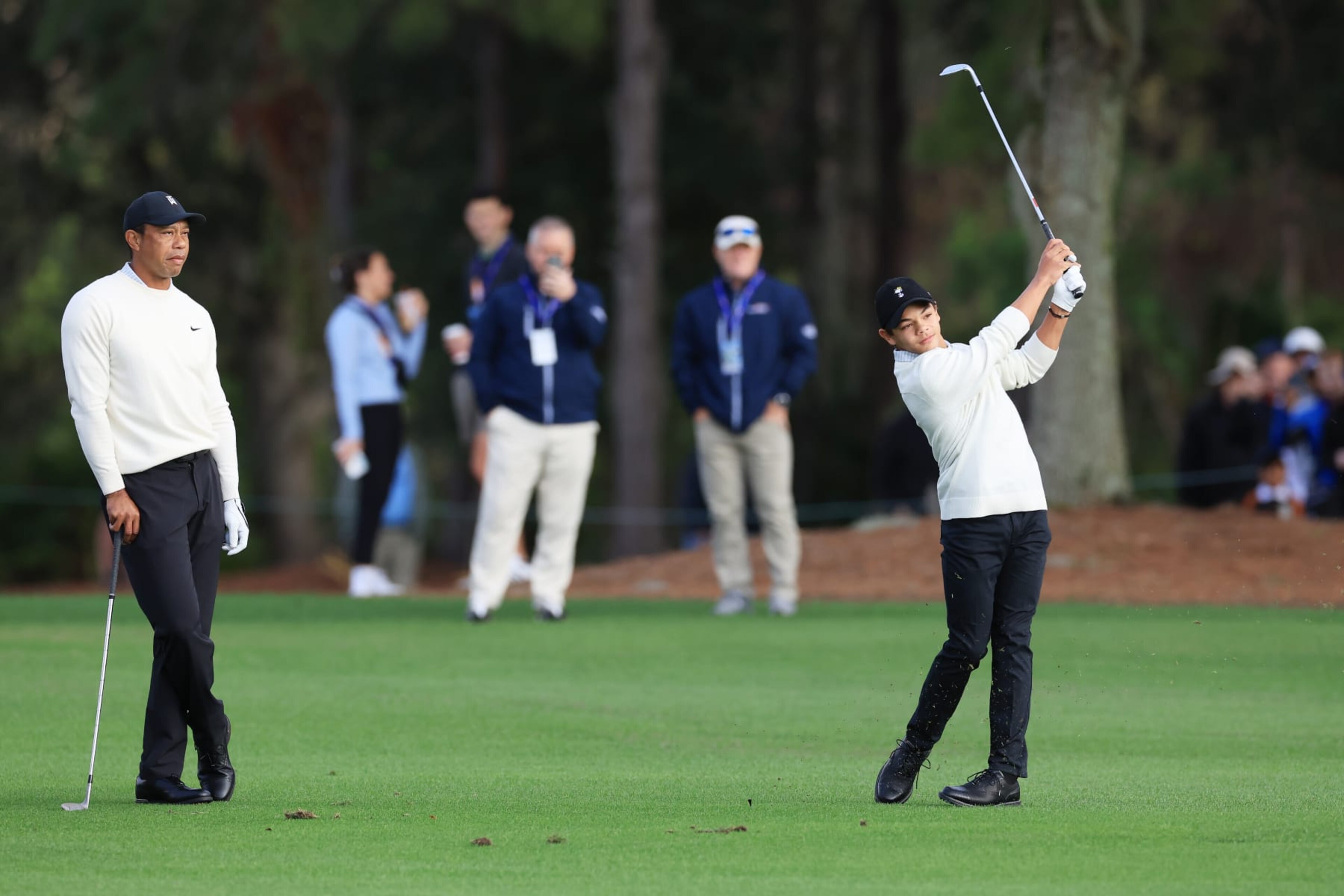 ORLANDO, FLORIDA - DECEMBER 16: Charlie Woods plays a shot on the first hole as Tiger Woods of the United States looks on during the pro-am prior to the PNC Championship at Ritz-Carlton Golf Club on December 16, 2022 in Orlando, Florida. (Photo by David Cannon/Getty Images) ORLANDO, FLORIDA - DECEMBER 16: Charlie Woods plays a shot on the first hole as Tiger Woods of the United States looks on during the pro-am prior to the PNC Championship at Ritz-Carlton Golf Club on December 16, 2022 in Orlando, Florida. (Photo by David Cannon/Getty Images)