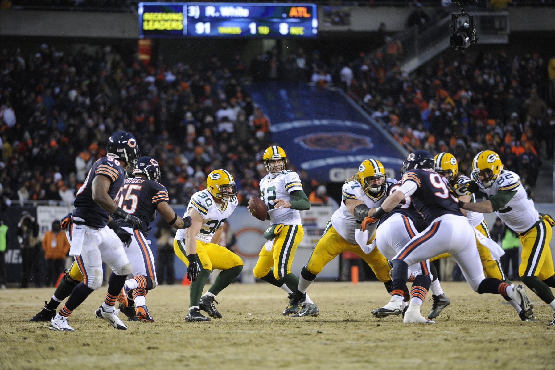 CHICAGO, IL - DECEMBER 29: Aaron Rodgers #12 of the Green Bay Packers plays against the Chicago Bears on December 29, 2013 at Soldier Field in Chicago, Illinois.  (Photo by David Banks/Getty Images) 