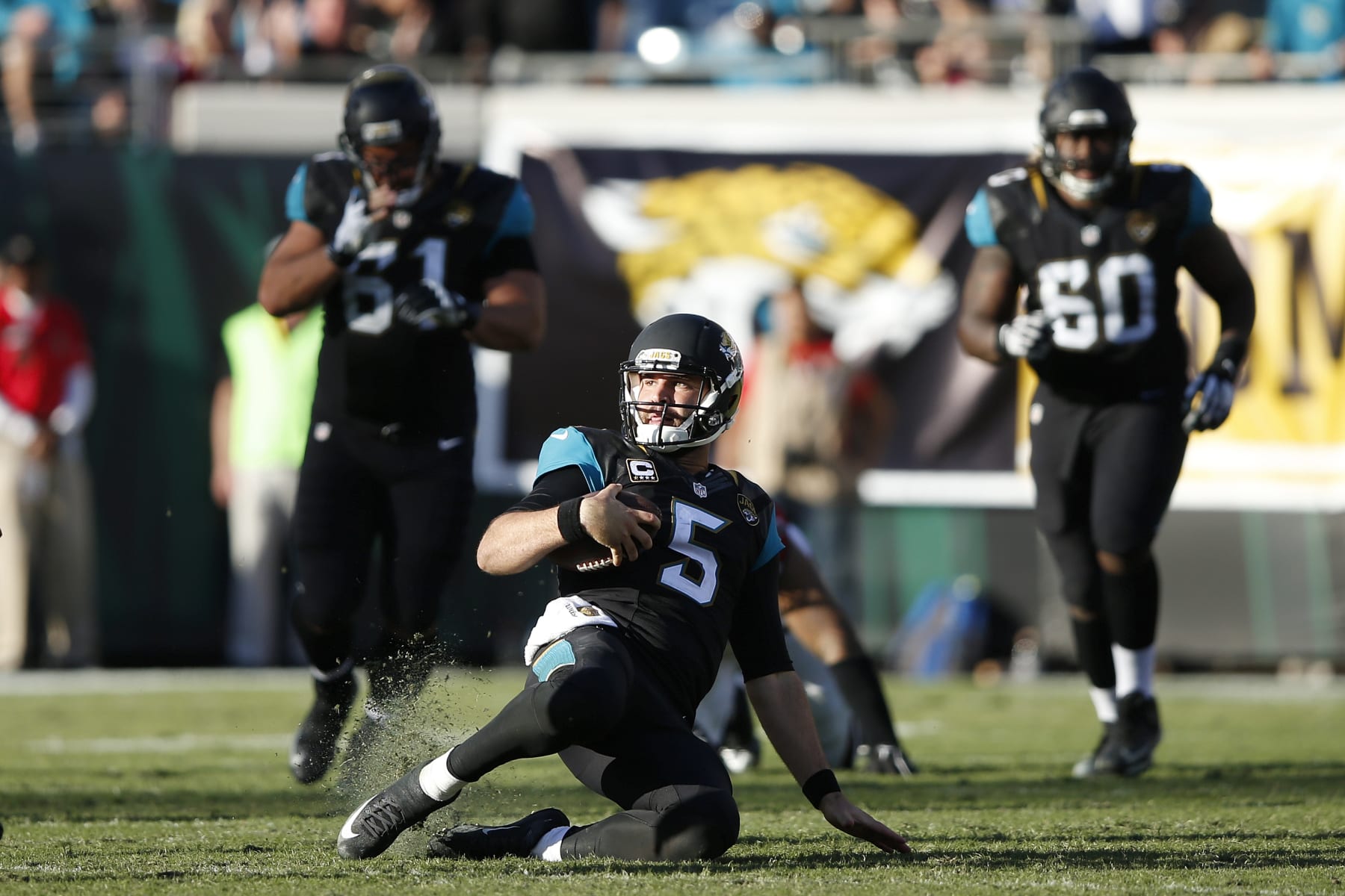 JACKSONVILLE, FL - DECEMBER 20: Blake Bortles #5 of the Jacksonville Jaguars slides after running for a first down against the Atlanta Falcons in the second half of the game at EverBank Field on December 20, 2015 in Jacksonville, Florida. The Falcons defeated the Jaguars 23-17. (Photo by Joe Robbins/Getty Images)