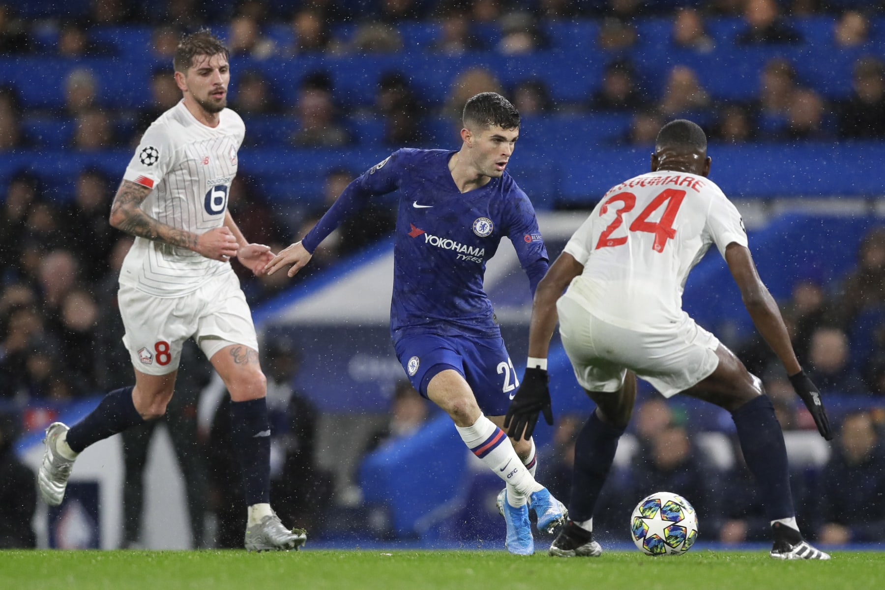 Chelsea's Christian Pulisic fights for the ball against Lille's Boubakary Soumare during the Champions League Group H soccer match between Chelsea and Lille at Stamford Bridge stadium in London Tuesday, Dec. 10, 2019. (AP Photo/Kirsty Wigglesworth)