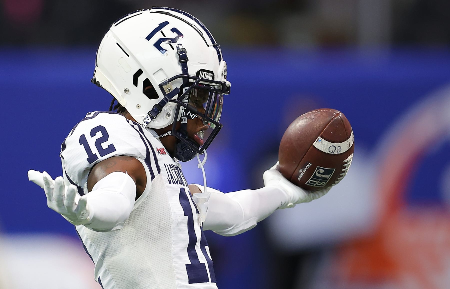 ATLANTA, GEORGIA - DECEMBER 17:  Travis Hunter #12 of the Jackson State Tigers warms up during pregame prior to the Cricket Celebration Bowl against the North Carolina Central Eagles at Mercedes-Benz Stadium on December 17, 2022 in Atlanta, Georgia. (Photo by Kevin C. Cox/Getty Images)