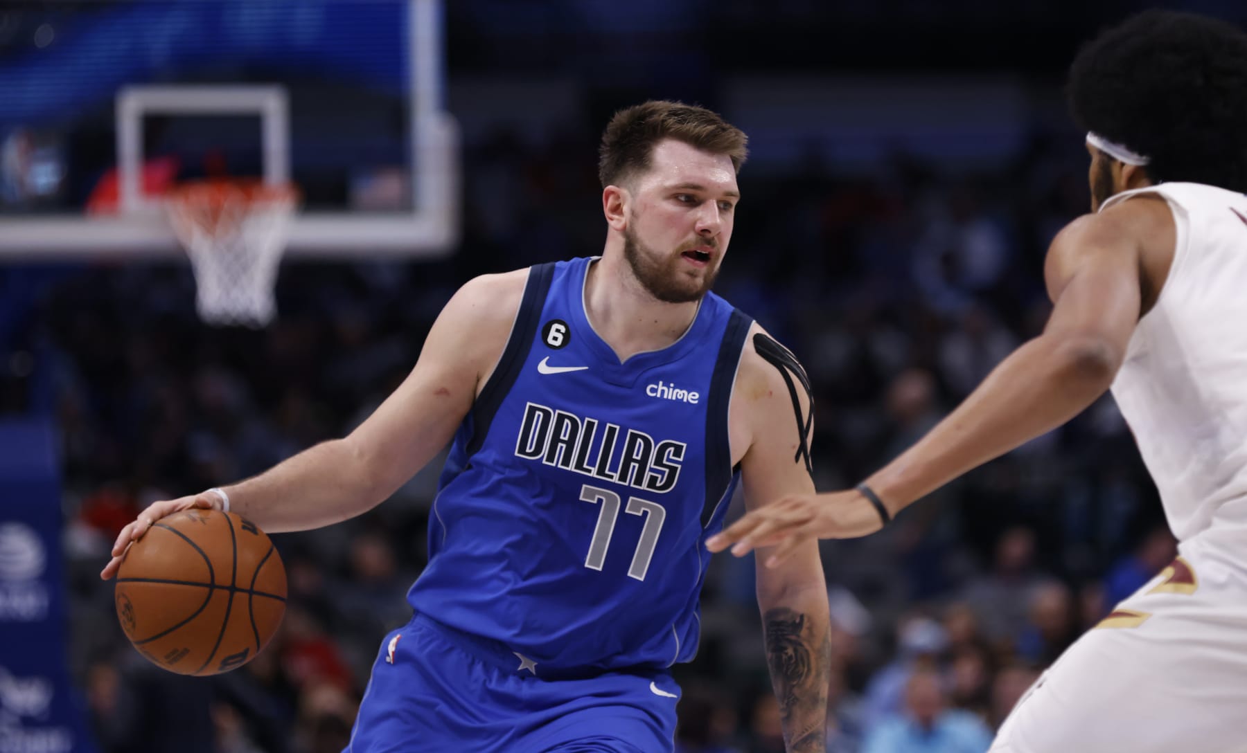 DALLAS, TX - DECEMBER 14: Luka Doncic #77 of the Dallas Mavericks handles the ball against the Cleveland Cavaliers in the second half at American Airlines Center on December 14, 2022 in Dallas, Texas. NOTE TO USER: User expressly acknowledges and agrees that, by downloading and or using this photograph, User is consenting to the terms and conditions of the Getty Images License Agreement. (Photo by Ron Jenkins/Getty Images)