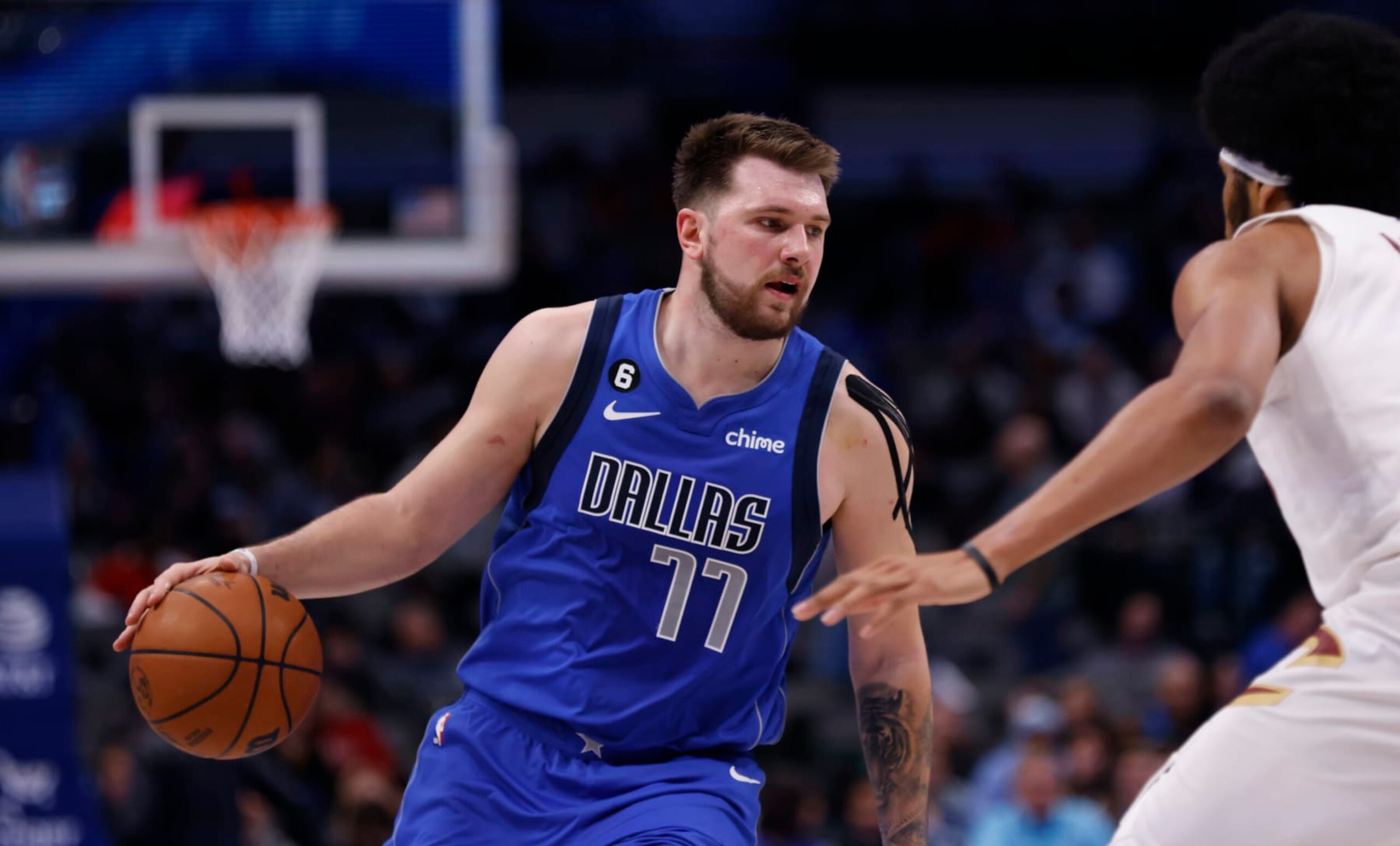 DALLAS, TX - DECEMBER 14: Luka Doncic #77 of the Dallas Mavericks handles the ball against the Cleveland Cavaliers in the second half at American Airlines Center on December 14, 2022 in Dallas, Texas. NOTE TO USER: User expressly acknowledges and agrees that, by downloading and or using this photograph, User is consenting to the terms and conditions of the Getty Images License Agreement. (Photo by Ron Jenkins/Getty Images)