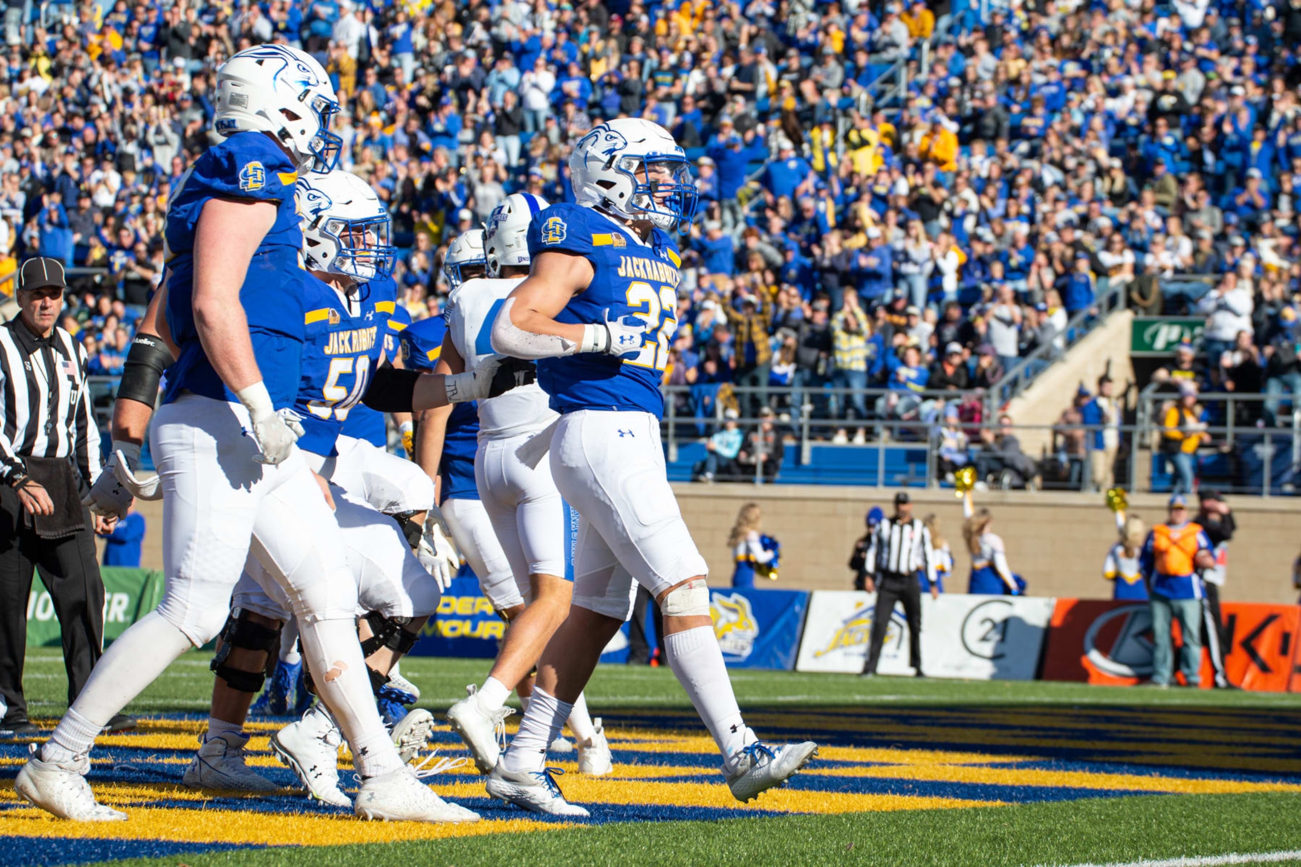 BROOKINGS, SD - OCTOBER 29: South Dakota State Jackrabbits Running back Isaiah Davis (22) celebrates with teammates after a touchdown during the college football game between the Indiana State Sycamores and the South Dakota State Jackrabbits on October 29th, 2022, at Dana J. Dykhouse Stadium, in Brookings, South Dakota. (Photo by Bailey Hillesheim/Icon Sportswire via Getty Images) BROOKINGS, SD - OCTOBER 29: South Dakota State Jackrabbits Running back Isaiah Davis (22) celebrates with teammates after a touchdown during the college football game between the Indiana State Sycamores and the South Dakota State Jackrabbits on October 29th, 2022, at Dana J. Dykhouse Stadium, in Brookings, South Dakota. (Photo by Bailey Hillesheim/Icon Sportswire via Getty Images)