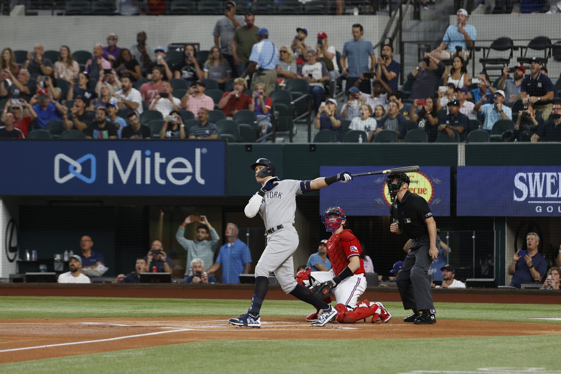 ARLINGTON, TX - OCTOBER 04: Aaron Judge #99 of the New York Yankees hits his 62nd home run of the season, breaking the American League home run record against the Texas Rangers at Globe Life Field on Tuesday, October 4, 2022 in Arlington, Texas. (Photo by New York Yankees/Getty Images)