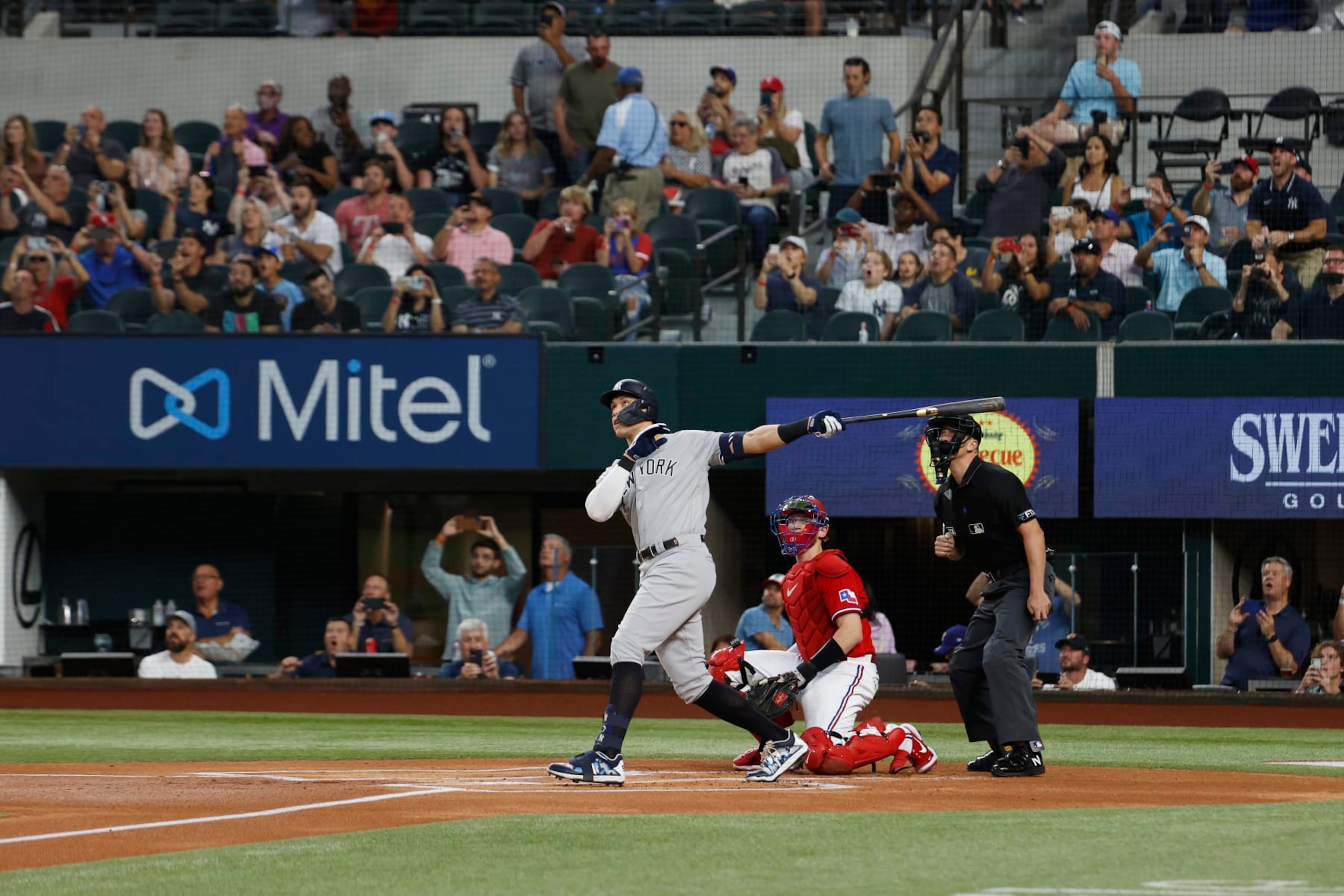 ARLINGTON, TX - OCTOBER 04: Aaron Judge #99 of the New York Yankees hits his 62nd home run of the season, breaking the American League home run record against the Texas Rangers at Globe Life Field on Tuesday, October 4, 2022 in Arlington, Texas. (Photo by New York Yankees/Getty Images)
