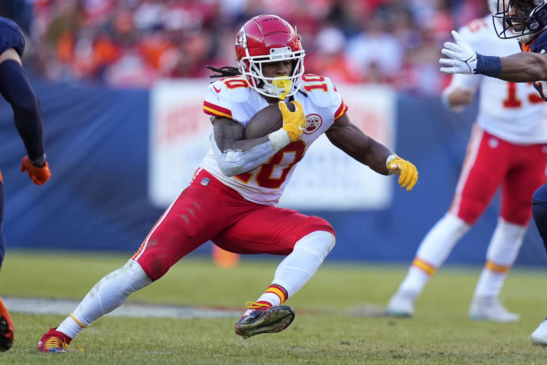 Kansas City Chiefs running back Isiah Pacheco (10) runs against the Denver Broncos during the first half of an NFL football game, Sunday, Dec. 11, 2022, in Denver. (AP Photo/Jack Dempsey)