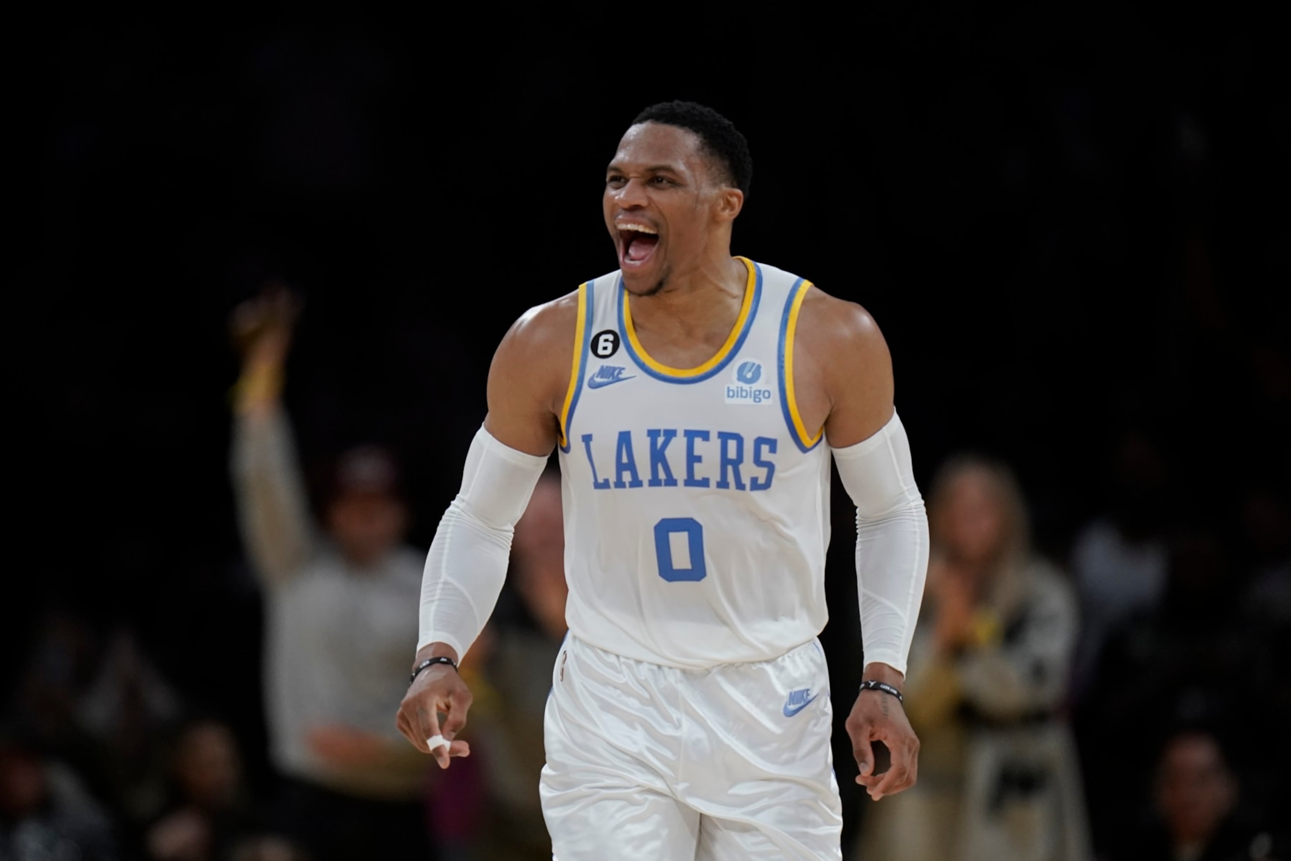 Los Angeles Lakers' Russell Westbrook reacts after scoring during second half of an NBA basketball game against the Boston Celtics Tuesday, Dec. 13, 2022, in Los Angeles. (AP Photo/Jae C. Hong)