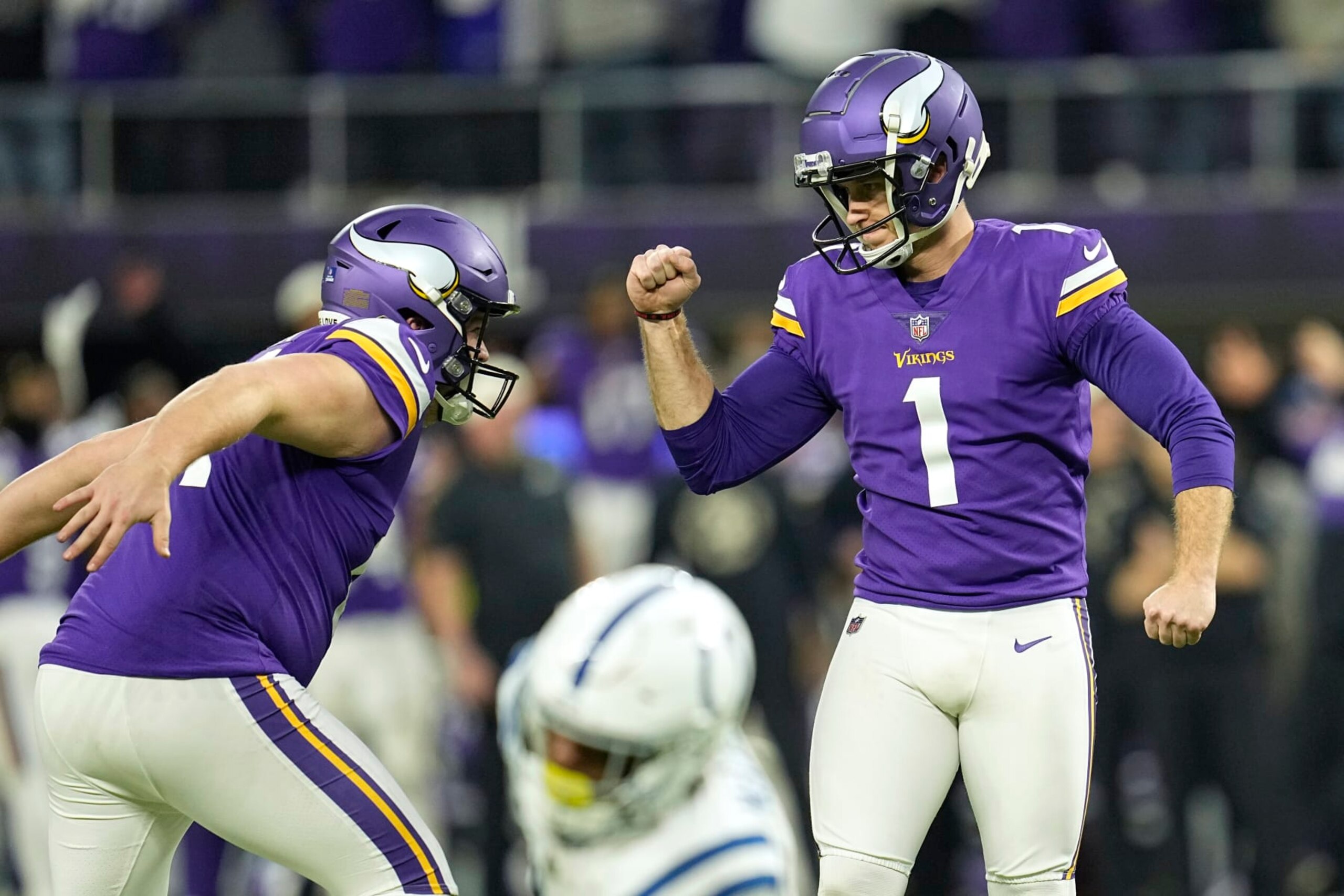 Minnesota Vikings place kicker Greg Joseph (1) celebrates after kicking a 40-yard field goal during overtime in an NFL football game against the Indianapolis Colts, Saturday, Dec. 17, 2022, in Minneapolis. The Vikings won 39-36 (AP Photo/Abbie Parr)