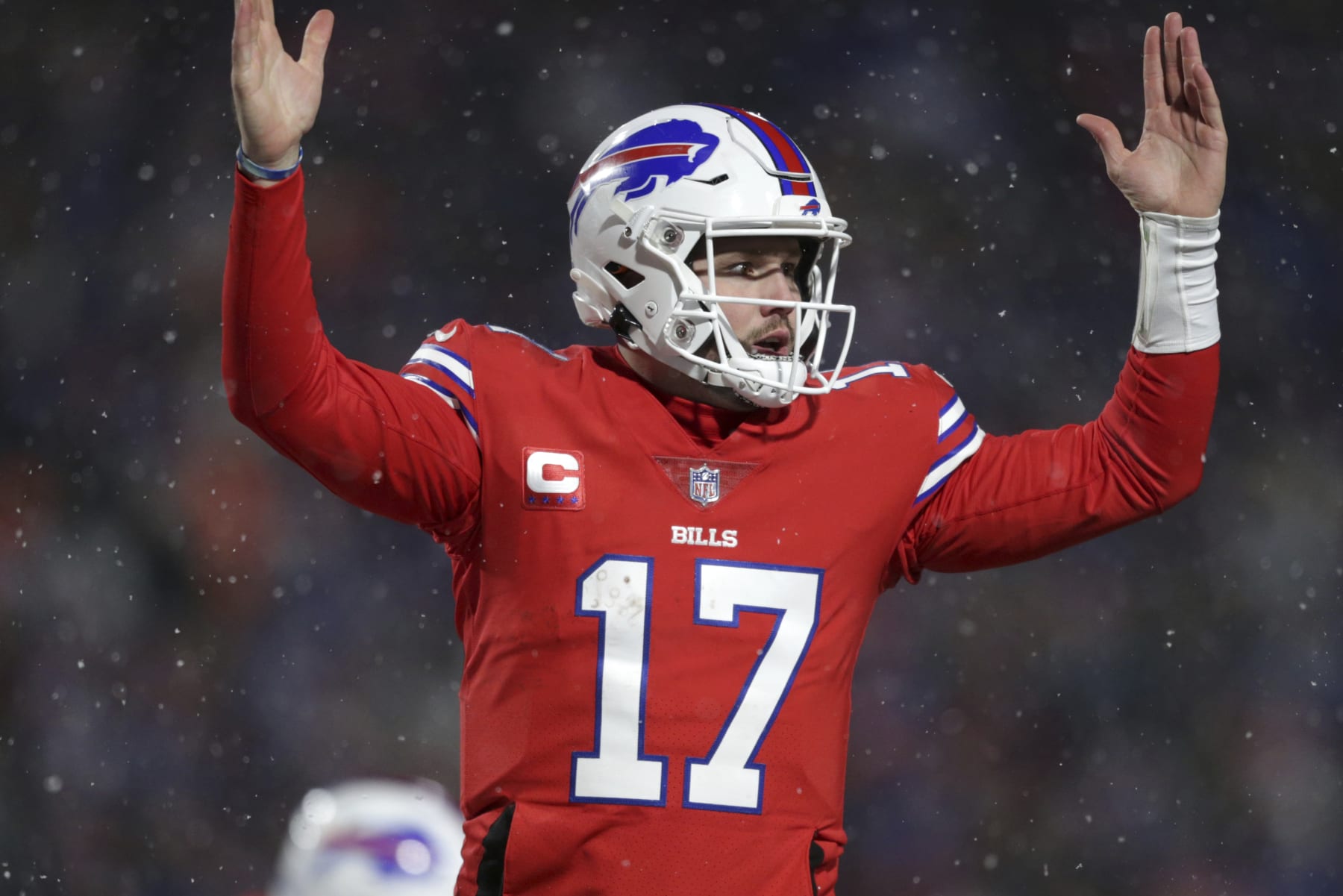 Buffalo Bills quarterback Josh Allen (17) celebrates after diving for a two-point conversion during the second half of an NFL football game against the Miami Dolphins in Orchard Park, N.Y., Saturday, Dec. 17, 2022. (AP Photo/Joshua Bessex)