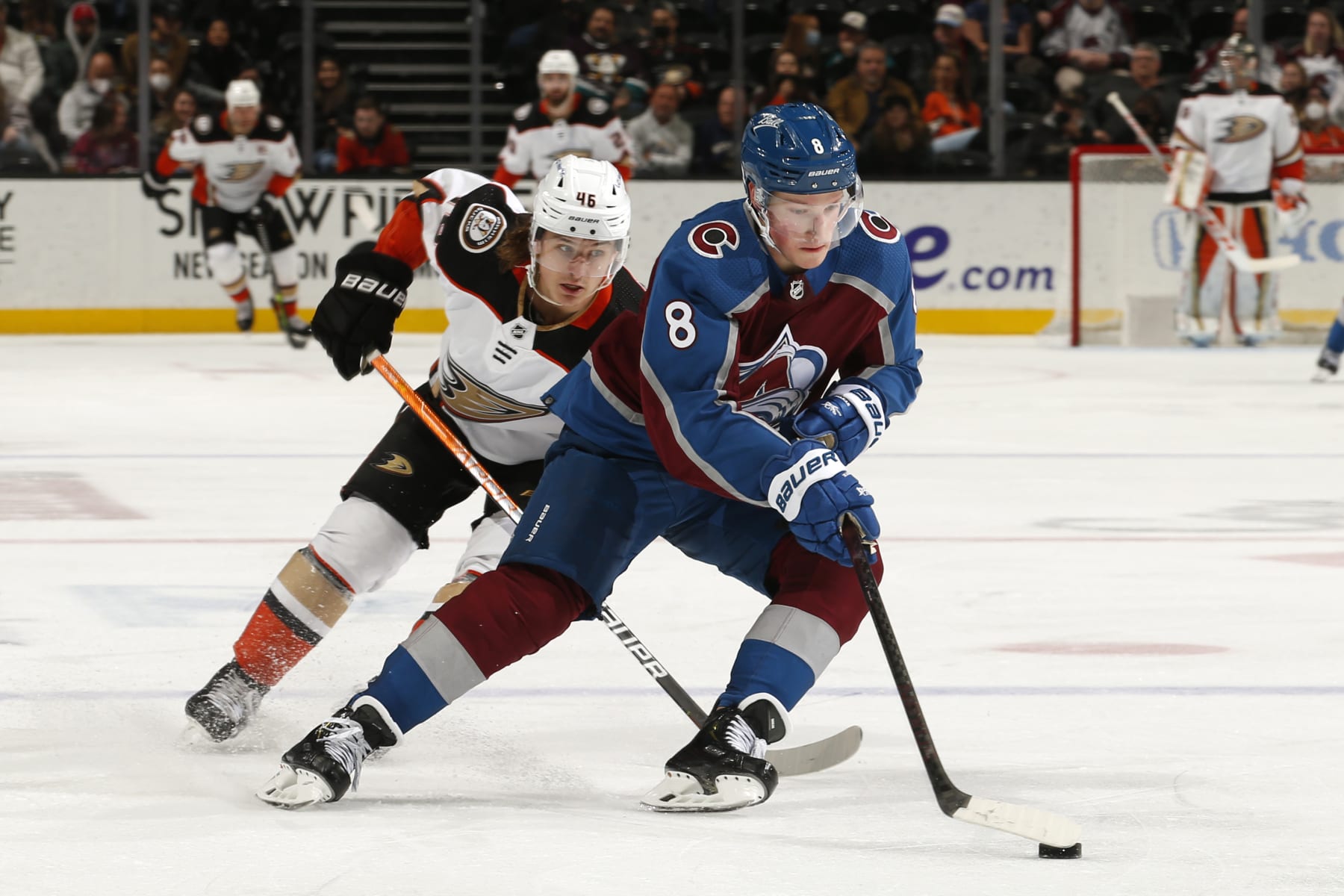 Anaheim Ducks center Trevor Zegras (left) and  Colorado Avalanche defenseman Cale Makar. 