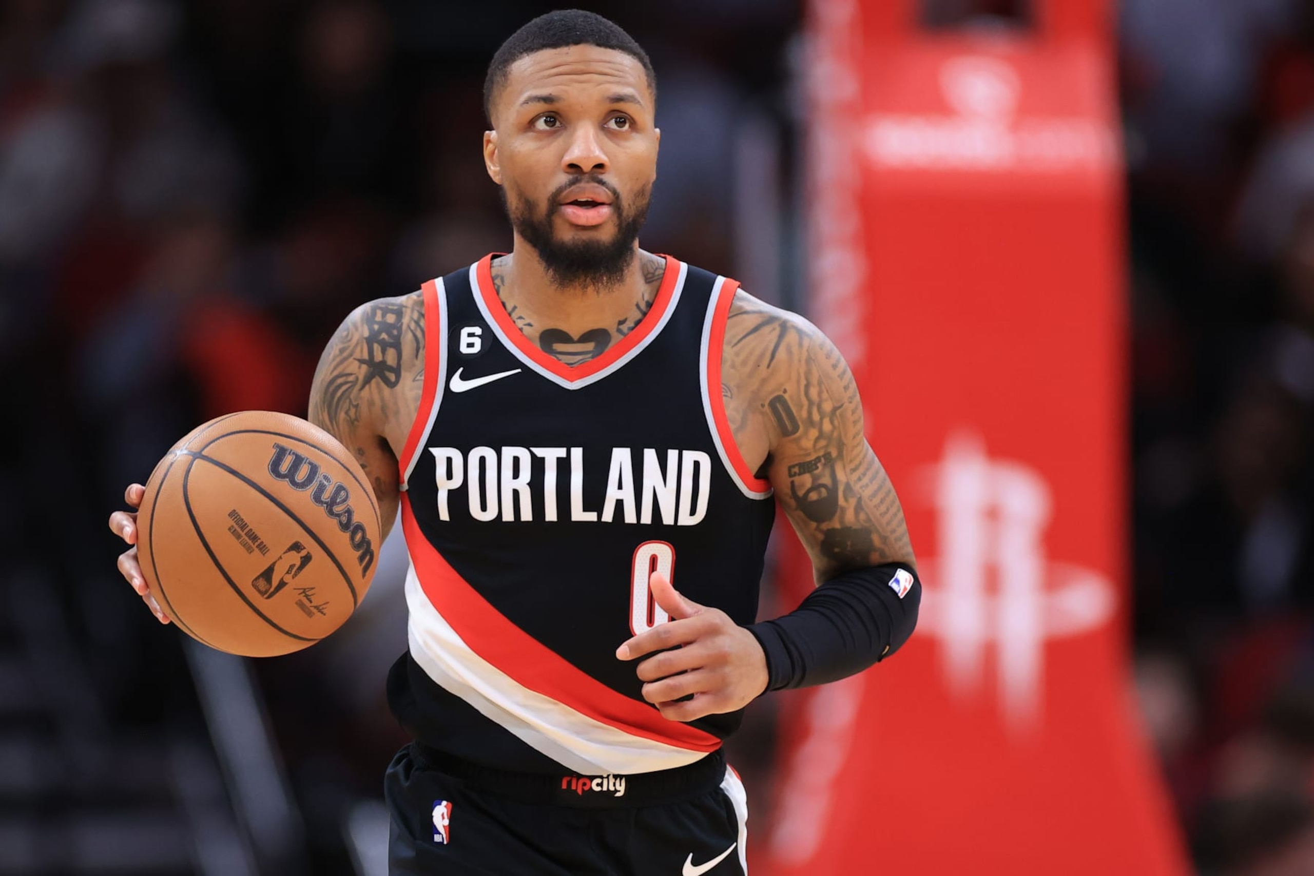 HOUSTON, TEXAS - DECEMBER 17: Damian Lillard #0 of the Portland Trail Blazers controls the ball against the Houston Rockets during the second half at Toyota Center on December 17, 2022 in Houston, Texas. NOTE TO USER: User expressly acknowledges and agrees that, by downloading and or using this photograph, User is consenting to the terms and conditions of the Getty Images License Agreement. (Photo by Carmen Mandato/Getty Images) HOUSTON, TEXAS - DECEMBER 17: Damian Lillard #0 of the Portland Trail Blazers controls the ball against the Houston Rockets during the second half at Toyota Center on December 17, 2022 in Houston, Texas. NOTE TO USER: User expressly acknowledges and agrees that, by downloading and or using this photograph, User is consenting to the terms and conditions of the Getty Images License Agreement. (Photo by Carmen Mandato/Getty Images)