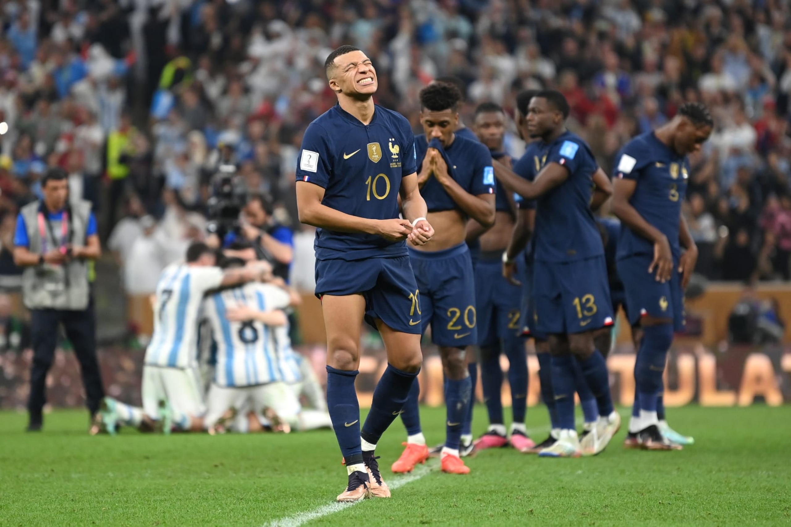 LUSAIL CITY, QATAR - DECEMBER 18: Kylian Mbappe of France looks dejected after a penalty shoot out loss during the FIFA World Cup Qatar 2022 Final match between Argentina and France at Lusail Stadium on December 18, 2022 in Lusail City, Qatar. (Photo by Michael Regan - FIFA/FIFA via Getty Images) LUSAIL CITY, QATAR - DECEMBER 18: Kylian Mbappe of France looks dejected after a penalty shoot out loss during the FIFA World Cup Qatar 2022 Final match between Argentina and France at Lusail Stadium on December 18, 2022 in Lusail City, Qatar. (Photo by Michael Regan - FIFA/FIFA via Getty Images)