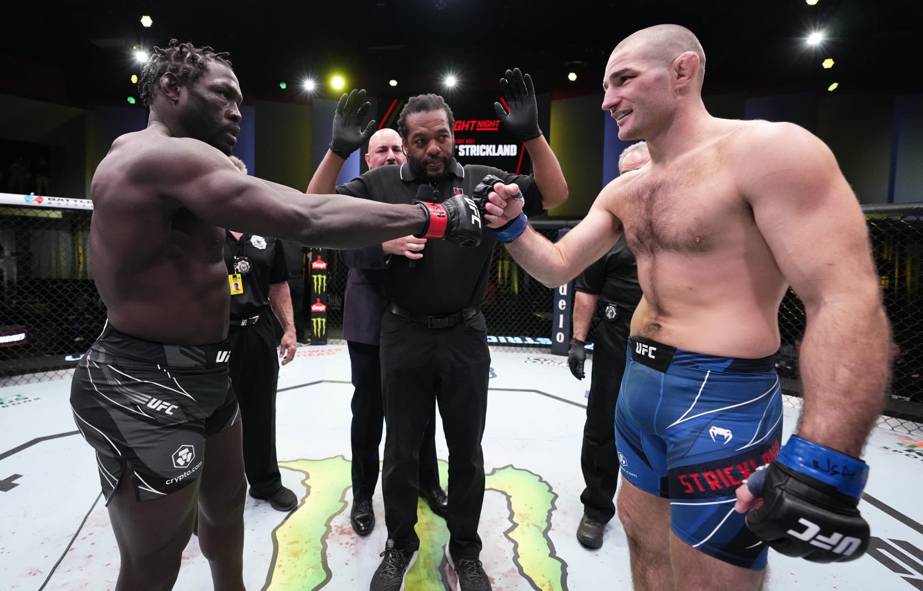 Jared Cannonier (right) and Sean Strickland square off.