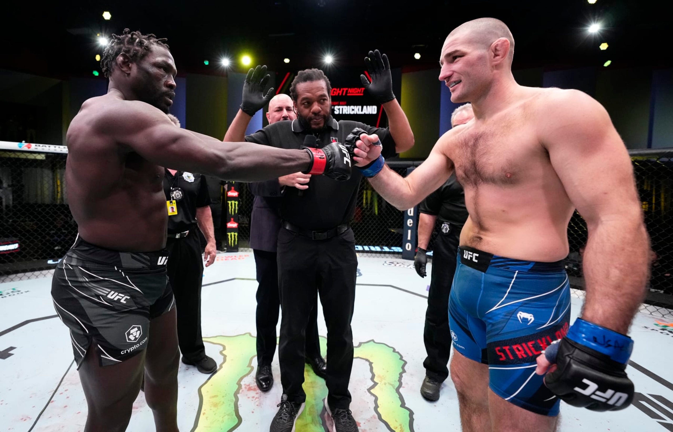 Jared Cannonier (right) and Sean Strickland square off.