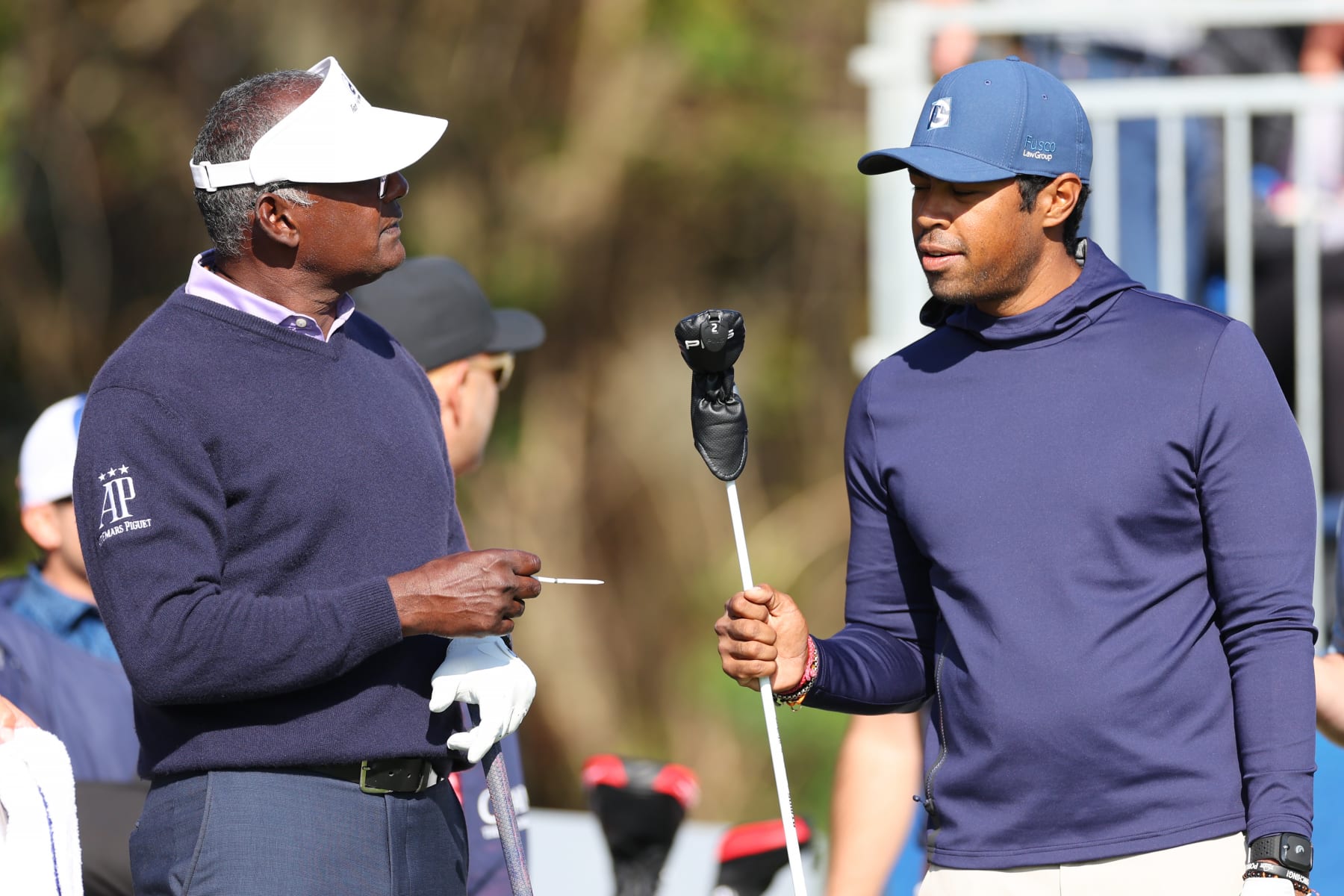 ORLANDO, FLORIDA - DECEMBER 17:  Vijay Singh of Fiji and son Qass Singh talk on the first tee during the first round of the PNC Championship at Ritz-Carlton Golf Club on December 17, 2022 in Orlando, Florida. (Photo by Mike Ehrmann/Getty Images)