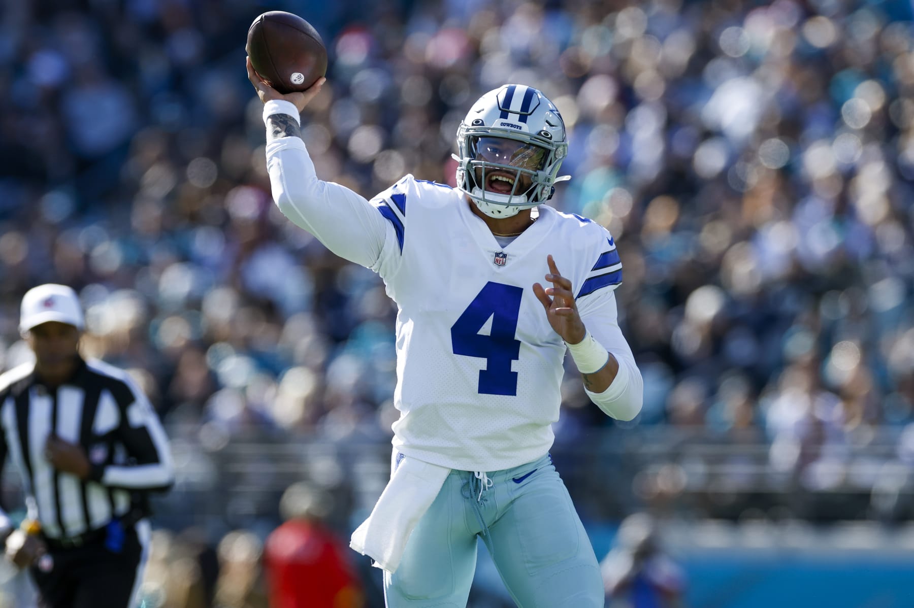JACKSONVILLE, FL - DECEMBER 18: Dallas Cowboys quarterback Dak Prescott (4) throws a pass during the game between the Dallas Cowboys and the Jacksonville Jaguars on December 18, 2022 at tIAA Bank Field in Jacksonville, Fl. (Photo by David Rosenblum/Icon Sportswire via Getty Images)
