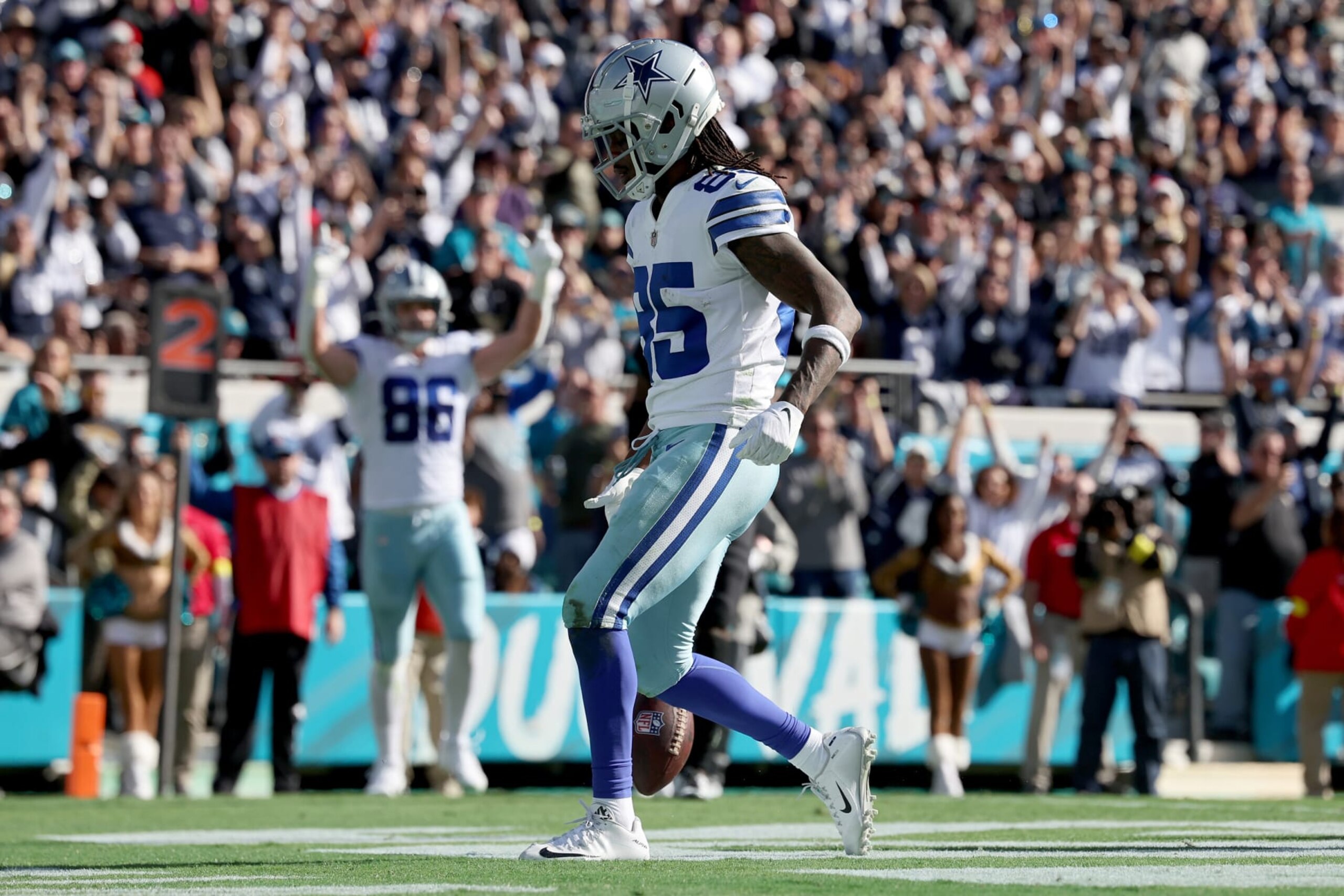 JACKSONVILLE, FLORIDA - DECEMBER 18: Noah Brown #85 of the Dallas Cowboys scores a touchdown against the Jacksonville Jaguars during the second quarter of the game at TIAA Bank Field on December 18, 2022 in Jacksonville, Florida. (Photo by Mike Carlson/Getty Images)