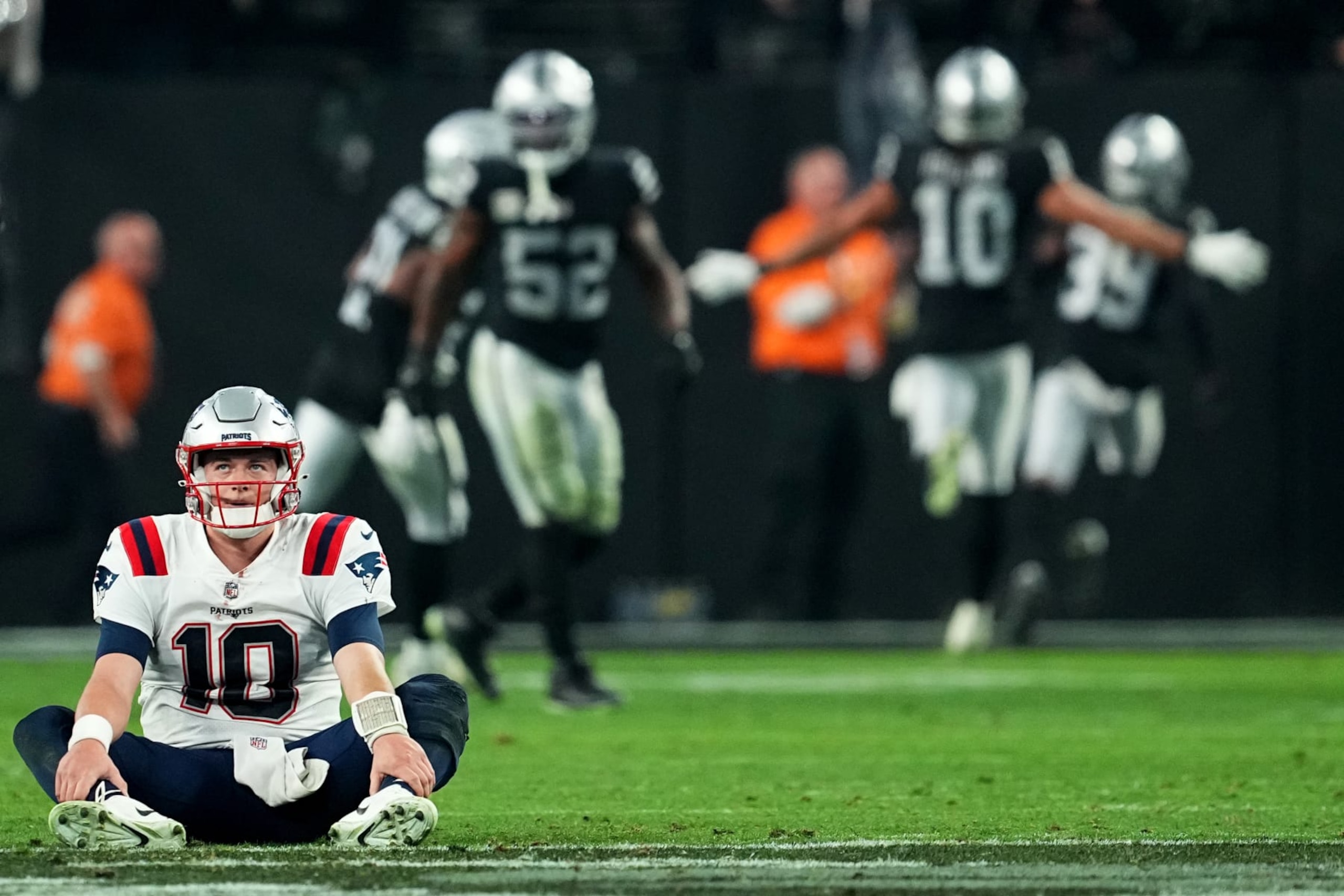 LAS VEGAS, NEVADA - DECEMBER 18: Mac Jones #10 of the New England Patriots looks on after losing to the Las Vegas Raiders at Allegiant Stadium on December 18, 2022 in Las Vegas, Nevada. (Photo by Chris Unger/Getty Images)