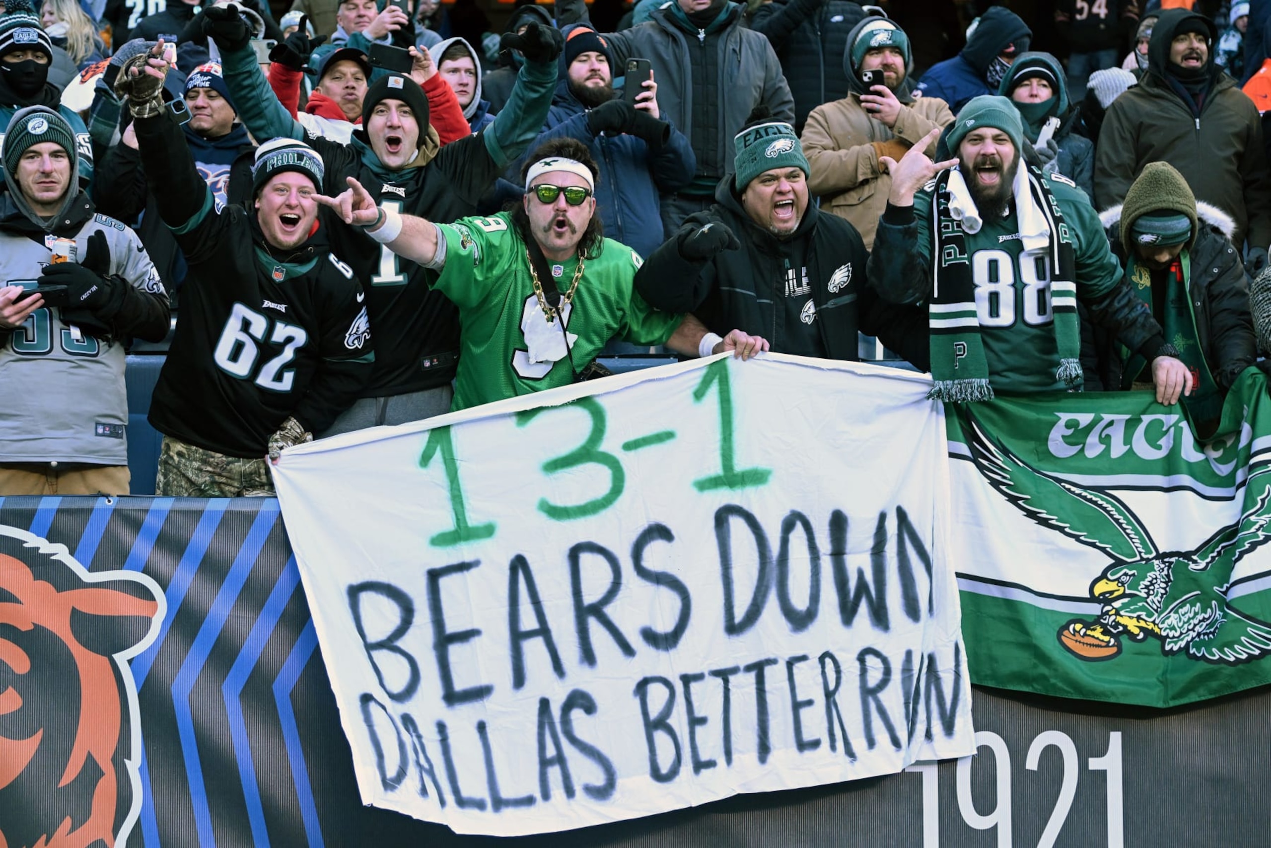 CHICAGO, ILLINOIS - DECEMBER 18: Philadelphia Eagles fans hold a sign during the second half in the game against the Chicago Bears at Soldier Field on December 18, 2022 in Chicago, Illinois. (Photo by Quinn Harris/Getty Images) CHICAGO, ILLINOIS - DECEMBER 18: Philadelphia Eagles fans hold a sign during the second half in the game against the Chicago Bears at Soldier Field on December 18, 2022 in Chicago, Illinois. (Photo by Quinn Harris/Getty Images)