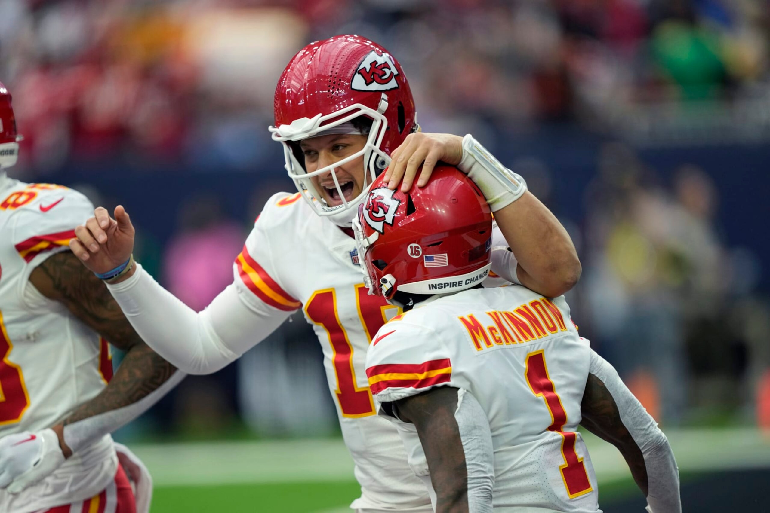 Kansas City Chiefs quarterback Patrick Mahomes (15) and running back Jerick McKinnon (1) celebrate after they connected on a pass for a touchdown against the Houston Texans during the first half of an NFL football game Sunday, Dec. 18, 2022, in Houston. (AP Photo/David J. Phillip) Kansas City Chiefs quarterback Patrick Mahomes (15) and running back Jerick McKinnon (1) celebrate after they connected on a pass for a touchdown against the Houston Texans during the first half of an NFL football game Sunday, Dec. 18, 2022, in Houston. (AP Photo/David J. Phillip)