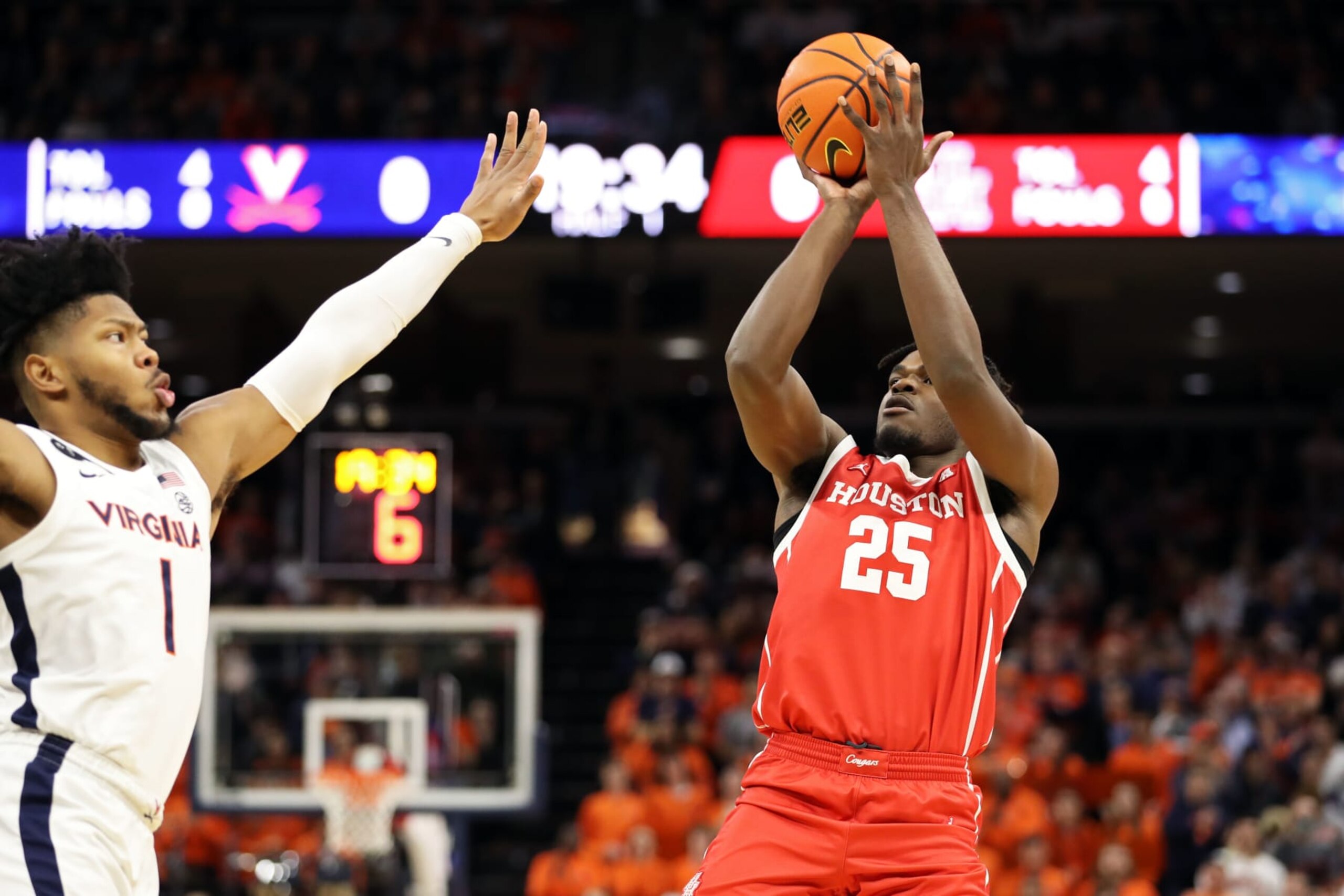 CHARLOTTESVILLE, VA - DECEMBER 17: Jarace Walker #25 of the Houston Cougars shoots over Jayden Gardner #1 of the Virginia Cavaliers in the first half during a game at John Paul Jones Arena on December 17, 2022 in Charlottesville, Virginia. (Photo by Ryan M. Kelly/Getty Images) CHARLOTTESVILLE, VA - DECEMBER 17: Jarace Walker #25 of the Houston Cougars shoots over Jayden Gardner #1 of the Virginia Cavaliers in the first half during a game at John Paul Jones Arena on December 17, 2022 in Charlottesville, Virginia. (Photo by Ryan M. Kelly/Getty Images)