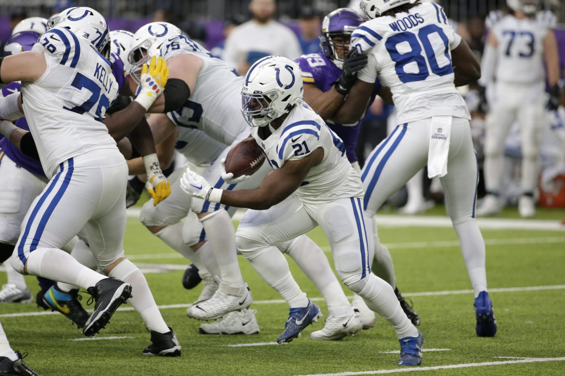 Indianapolis Colts running back Zack Moss (21) carries the ball up field during the first half of an NFL football game against the Minnesota Vikings, Saturday, Dec. 17, 2022, in Minneapolis. (AP Photo/Andy Clayton-King)