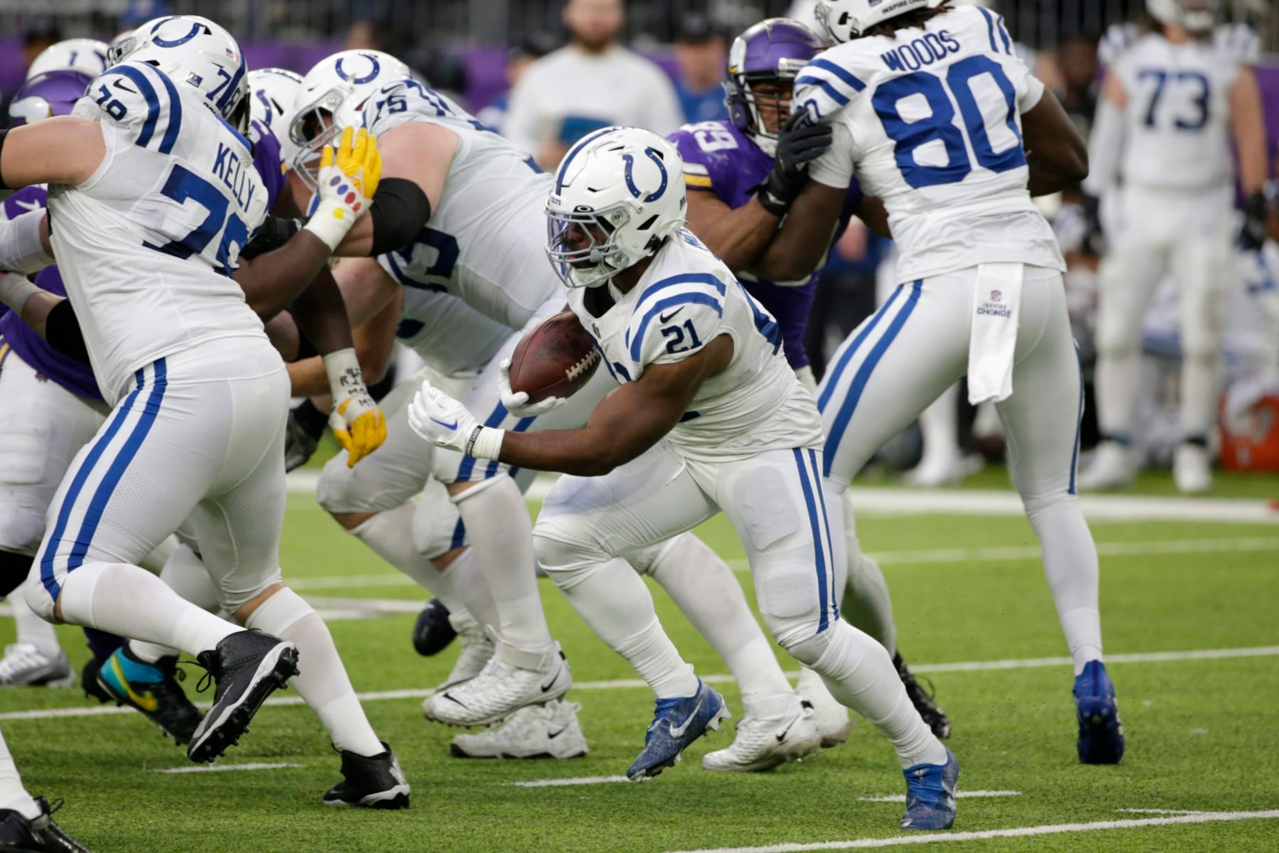 Indianapolis Colts running back Zack Moss (21) carries the ball up field during the first half of an NFL football game against the Minnesota Vikings, Saturday, Dec. 17, 2022, in Minneapolis. (AP Photo/Andy Clayton-King)