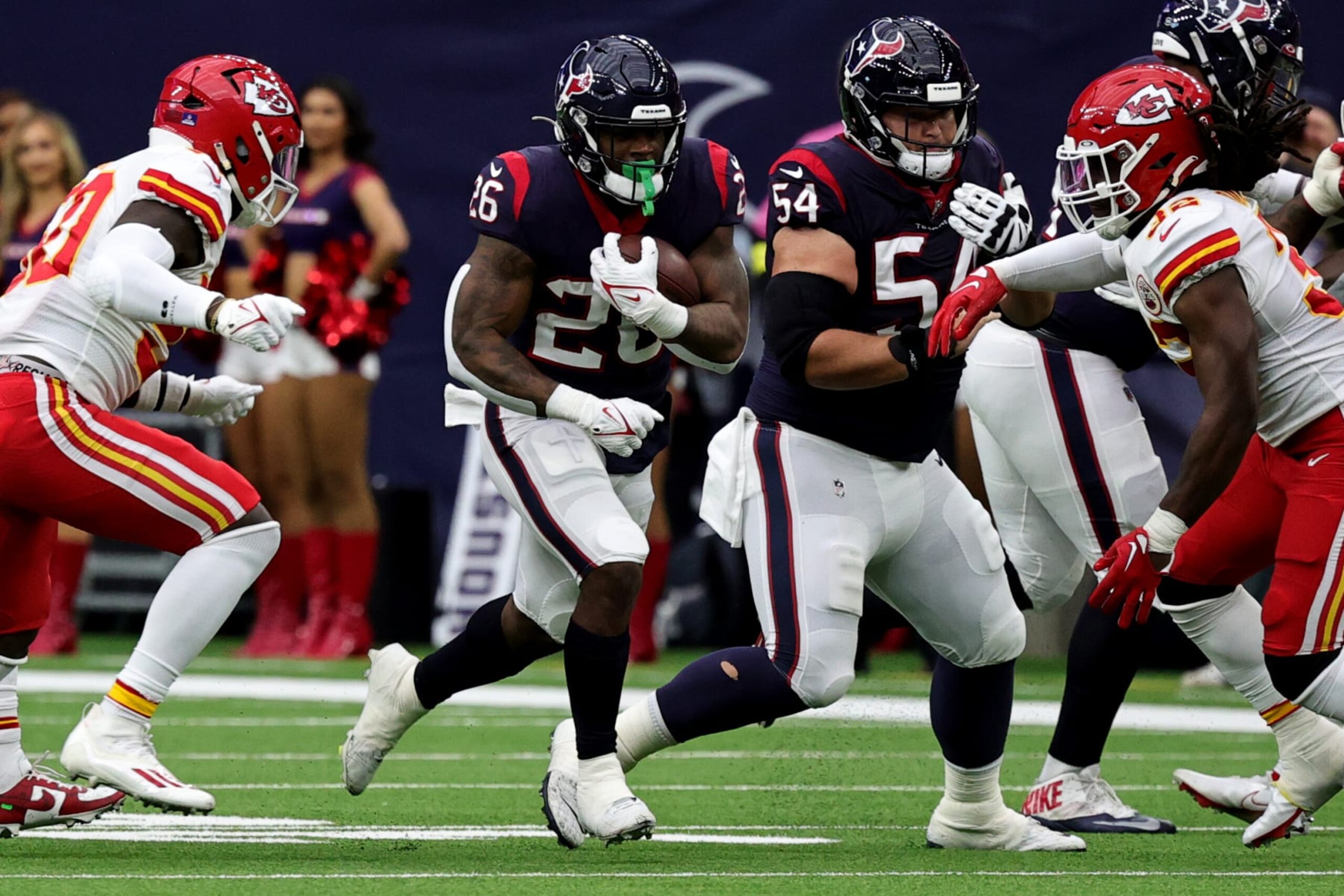 HOUSTON, TEXAS - DECEMBER 18: Royce Freeman #26 of the Houston Texans runs with the ball during the second quarter against the Kansas City Chiefs at NRG Stadium on December 18, 2022 in Houston, Texas. (Photo by Bob Levey/Getty Images)