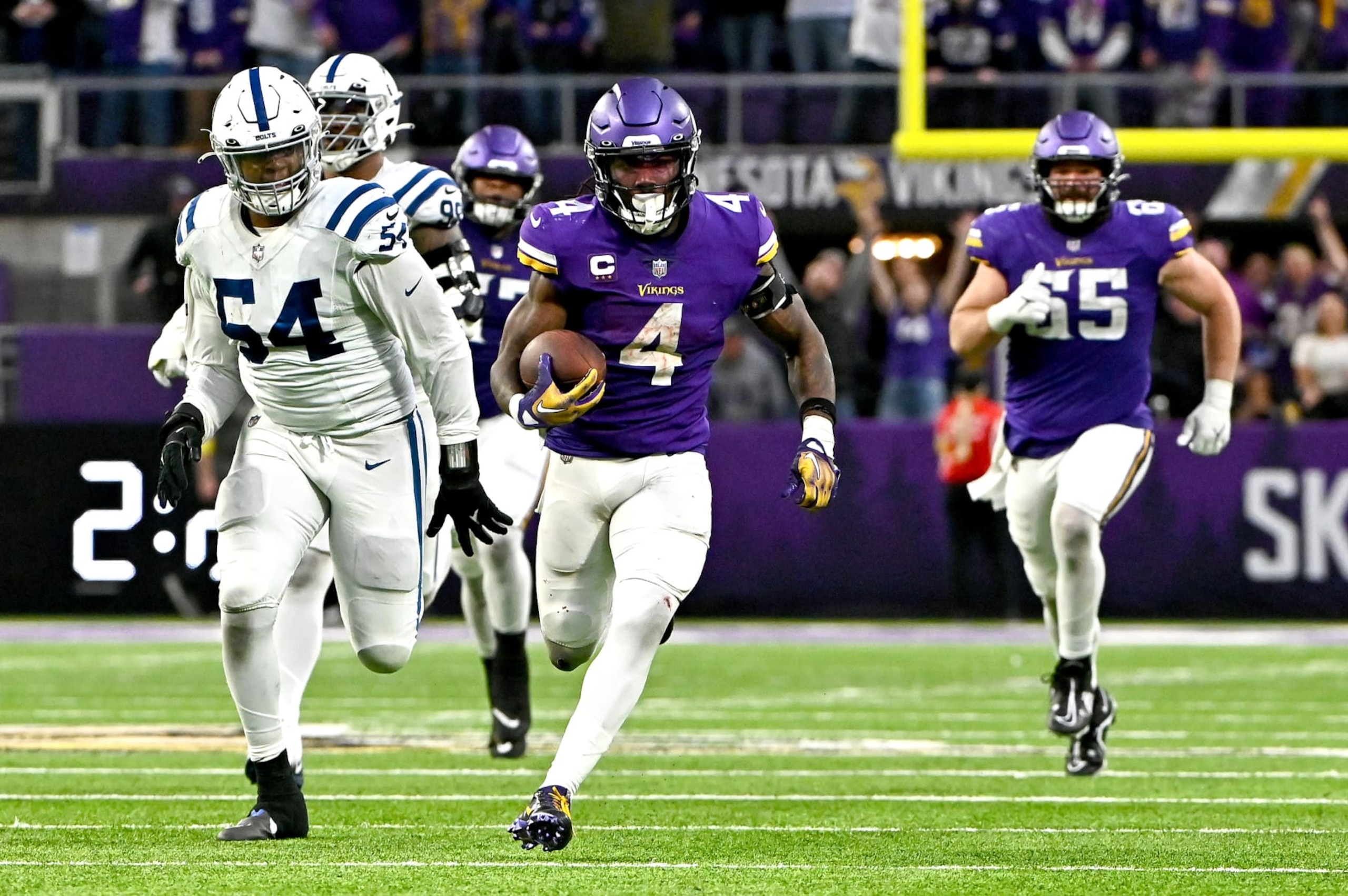 MINNEAPOLIS, MINNESOTA - DECEMBER 17: Dalvin Cook #4 of the Minnesota Vikings rushes for a touchdown against the Indianapolis Colts during the fourth quarter of the game at U.S. Bank Stadium on December 17, 2022 in Minneapolis, Minnesota. (Photo by Stephen Maturen/Getty Images)