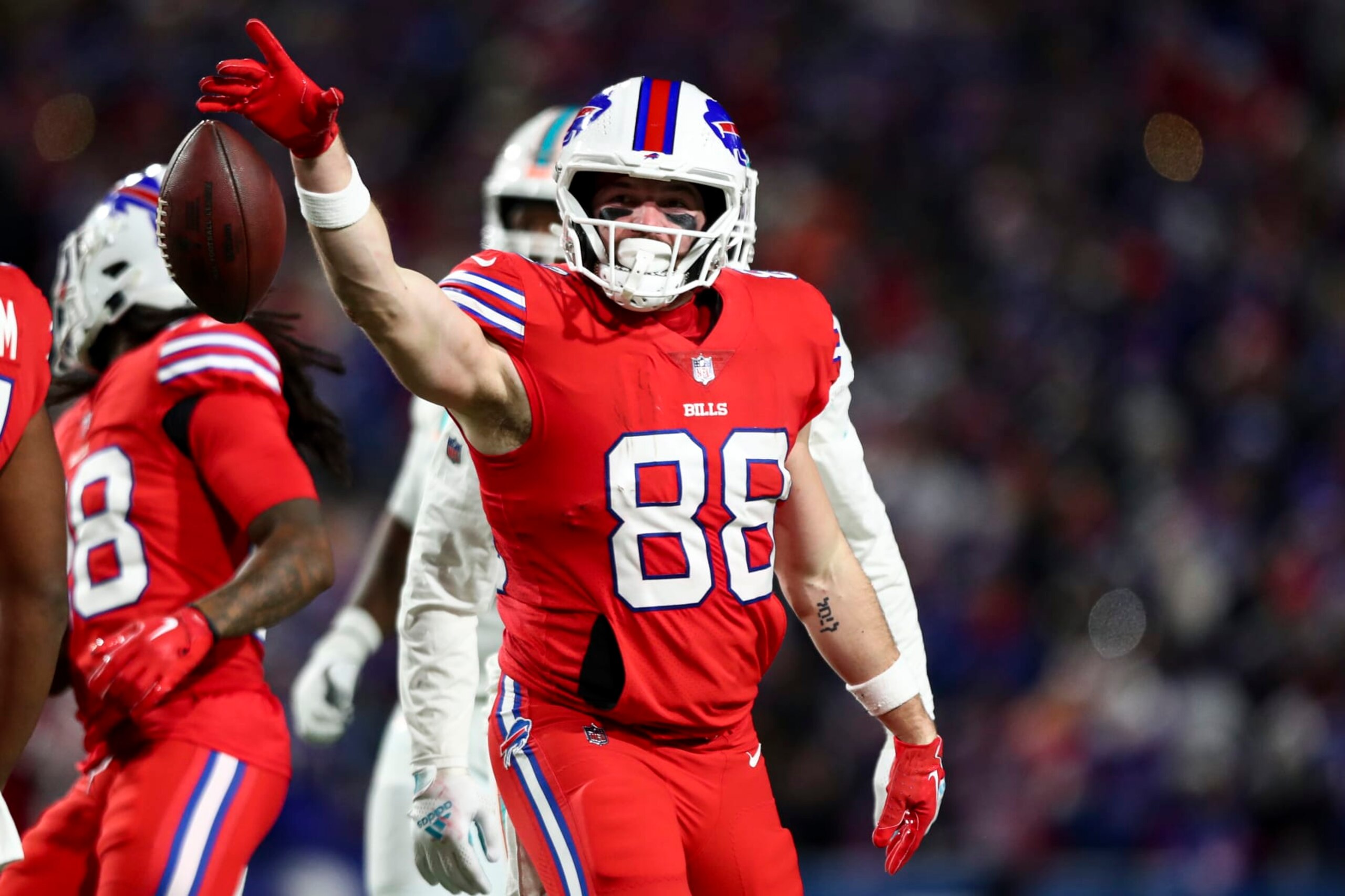 ORCHARD PARK, NY - DECEMBER 17: Dawson Knox #88 of the Buffalo Bills celebrates after a play during the third quarter of an NFL football game against the Miami Dolphins at Highmark Stadium on December 17, 2022 in Orchard Park, New York. (Photo by Kevin Sabitus/Getty Images)