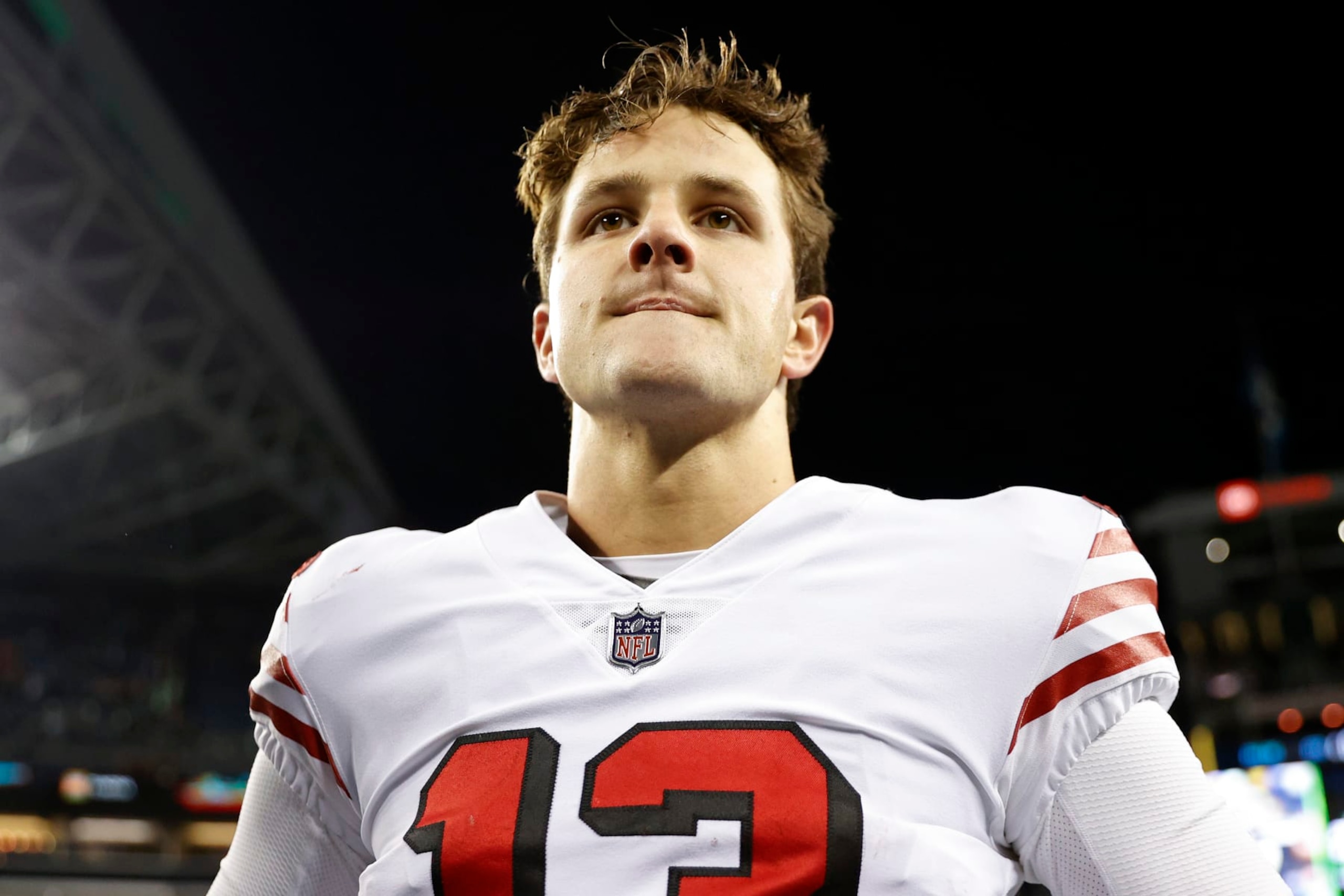 SEATTLE, WASHINGTON - DECEMBER 15: Brock Purdy #13 of the San Francisco 49ers looks on after defeating the Seattle Seahawks at Lumen Field on December 15, 2022 in Seattle, Washington. (Photo by Steph Chambers/Getty Images)