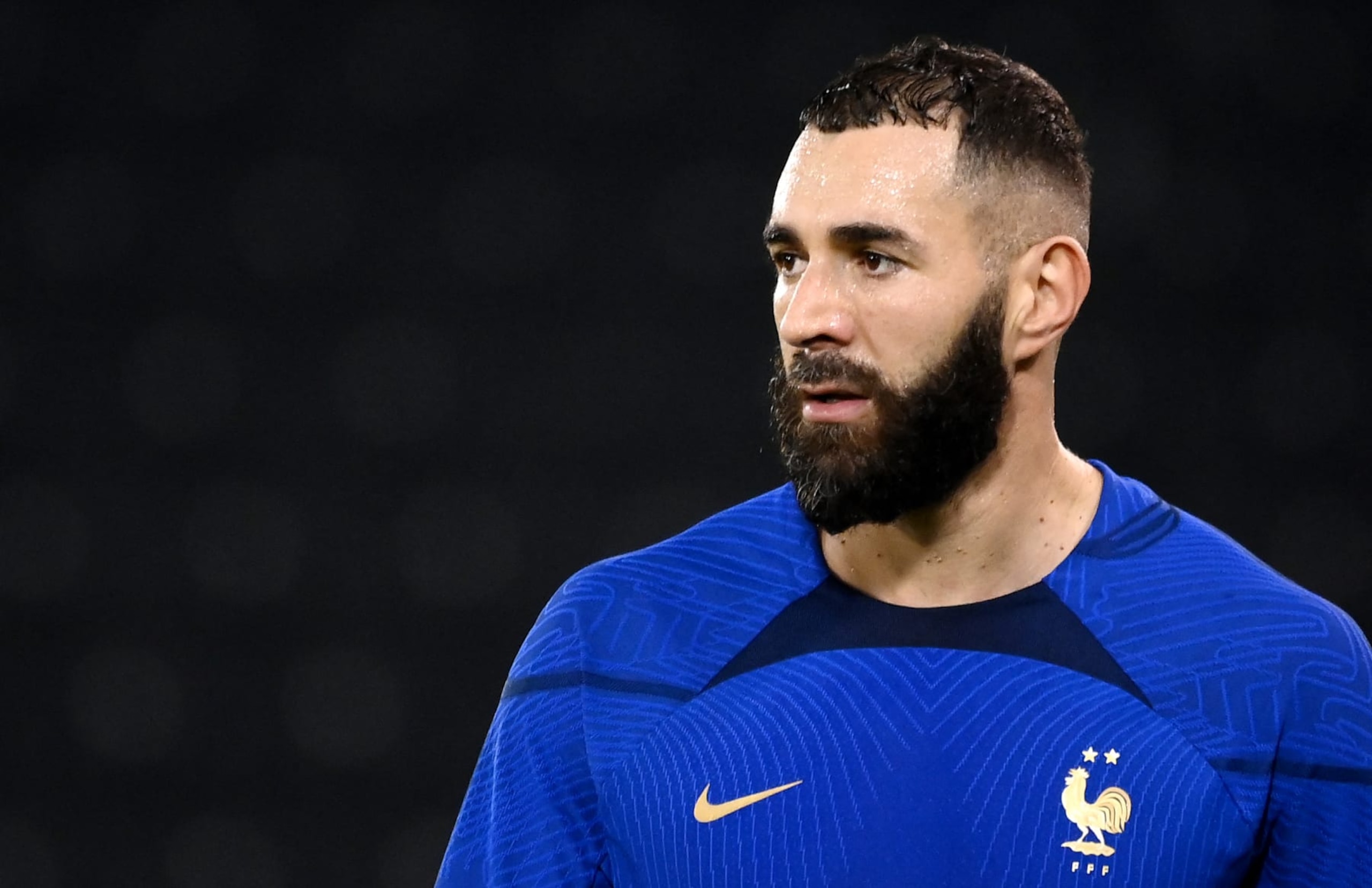 France's forward Karim Benzema looks on during a training session at the Jassim-bin-Hamad Stadium in Doha on November 17, 2022, ahead of the Qatar 2022 World Cup football tournament. (Photo by FRANCK FIFE / AFP) (Photo by FRANCK FIFE/AFP via Getty Images) France's forward Karim Benzema looks on during a training session at the Jassim-bin-Hamad Stadium in Doha on November 17, 2022, ahead of the Qatar 2022 World Cup football tournament. (Photo by FRANCK FIFE / AFP) (Photo by FRANCK FIFE/AFP via Getty Images)