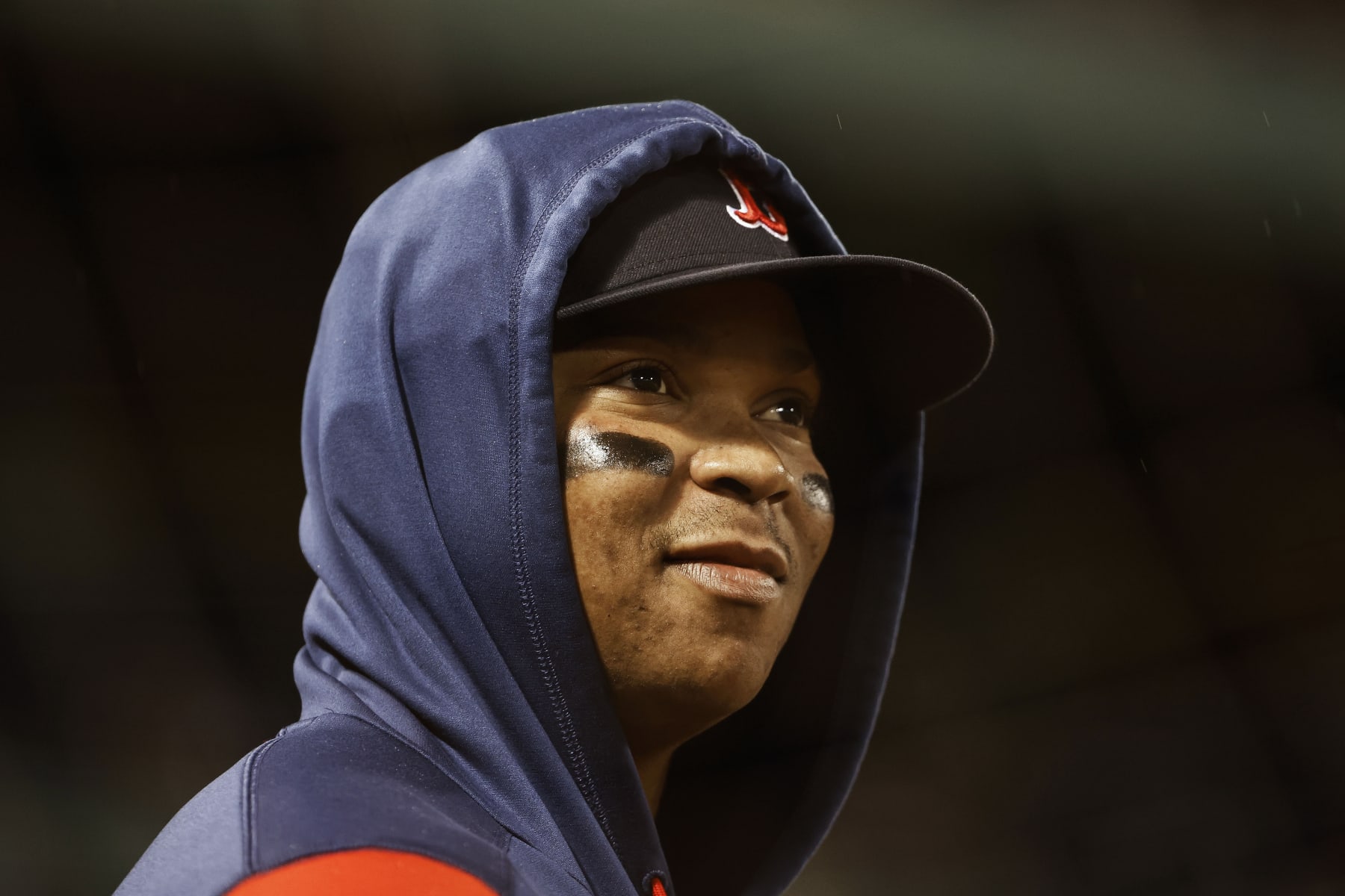 BOSTON, MA - OCTOBER 5: Rafael Devers #11 of the Boston Red Sox looks on against the Tampa Bay Rays during the seventh inning at Fenway Park on October 5, 2022 in Boston, Massachusetts. (Photo By Winslow Townson/Getty Images)