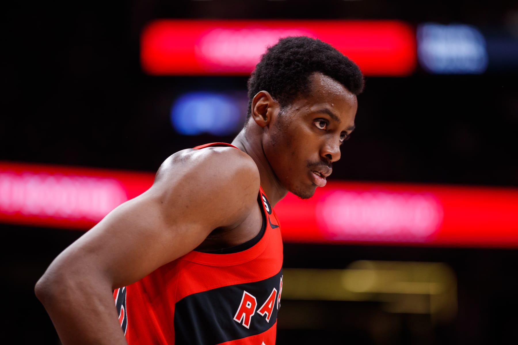 TORONTO, ON - DECEMBER 07: Christian Koloko #35 of the Toronto Raptors looks on during their NBA game against the Los Angeles Lakers during the first half of their NBA game at Scotiabank Arena on December 7, 2022 in Toronto, Canada. NOTE TO USER: User expressly acknowledges and agrees that, by downloading and or using this photograph, User is consenting to the terms and conditions of the Getty Images License Agreement. (Photo by Cole Burston/Getty Images)