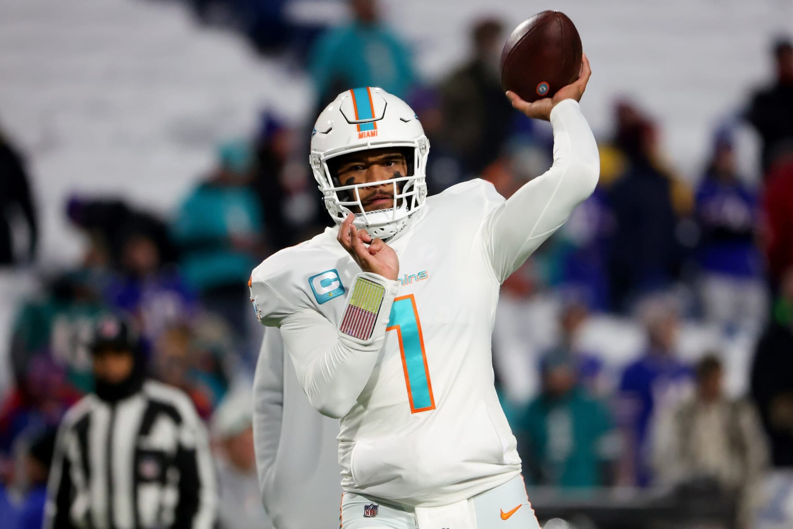 ORCHARD PARK, NEW YORK - DECEMBER 17: Tua Tagovailoa #1 of the Miami Dolphins warms up prior to a game against the Buffalo Bills at Highmark Stadium on December 17, 2022 in Orchard Park, New York. (Photo by Timothy T Ludwig/Getty Images)