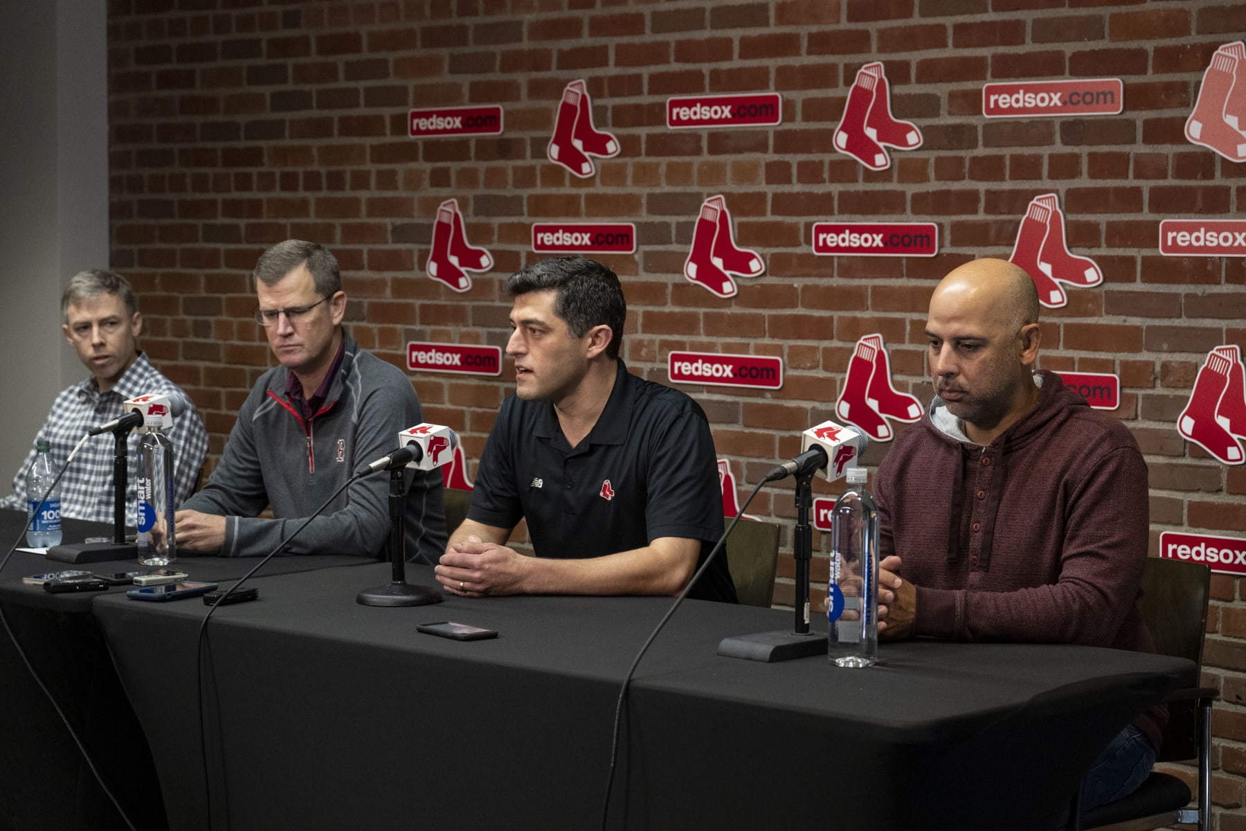 BOSTON, MA - OCTOBER 6: General Manager Brian OHalloran, President & CEO Sam Kennedy, Chief Baseball Officer Chaim Bloom, and Manager Alex Cora of the Boston Red Sox address the media during a press conference following the final game of the 2022 season on October 6, 2022 at Fenway Park in Boston, Massachusetts. (Photo by Billie Weiss/Boston Red Sox/Getty Images)