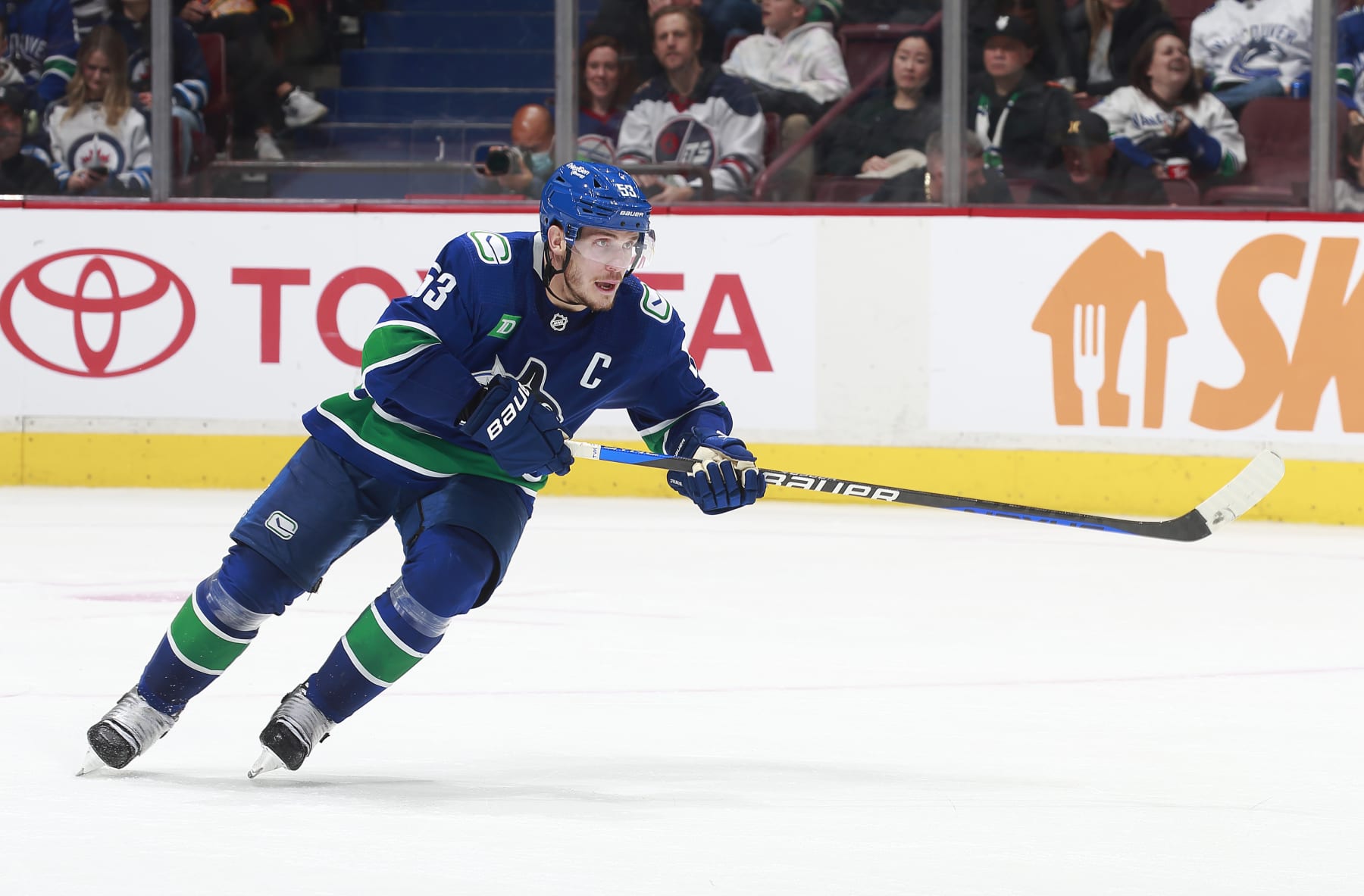 VANCOUVER, CANADA - DECEMBER 17: Bo Horvat #53 of the Vancouver Canucks skates up ice during their NHL game against the Winnipeg Jets at Rogers Arena December 17, 2022 in Vancouver, British Columbia, Canada.  (Photo by Jeff Vinnick/NHLI via Getty Images)