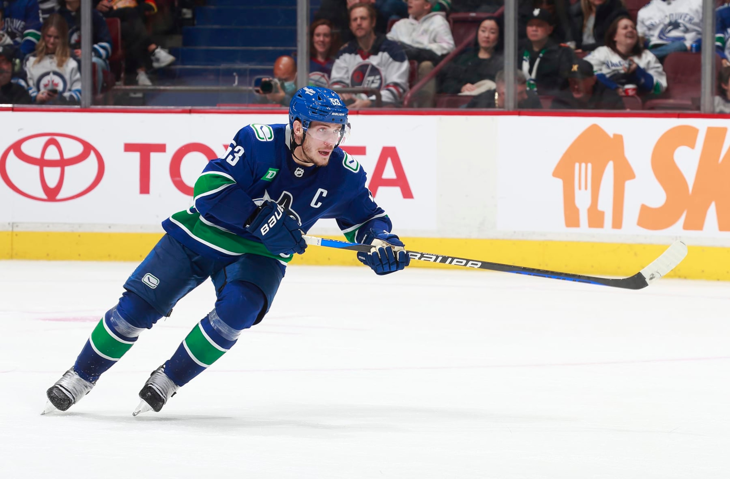 VANCOUVER, CANADA - DECEMBER 17: Bo Horvat #53 of the Vancouver Canucks skates up ice during their NHL game against the Winnipeg Jets at Rogers Arena December 17, 2022 in Vancouver, British Columbia, Canada.  (Photo by Jeff Vinnick/NHLI via Getty Images)