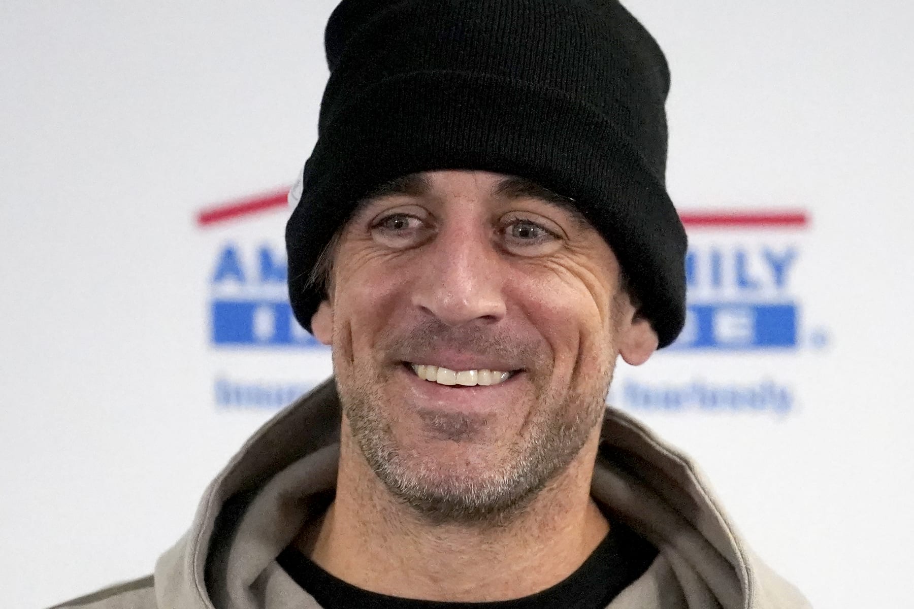 Green Bay Packers' Aaron Rodgers smiles during a news conference after an NFL football game against the Chicago Bears Sunday, Dec. 4, 2022, in Chicago. (AP Photo/Charles Rex Arbogast)