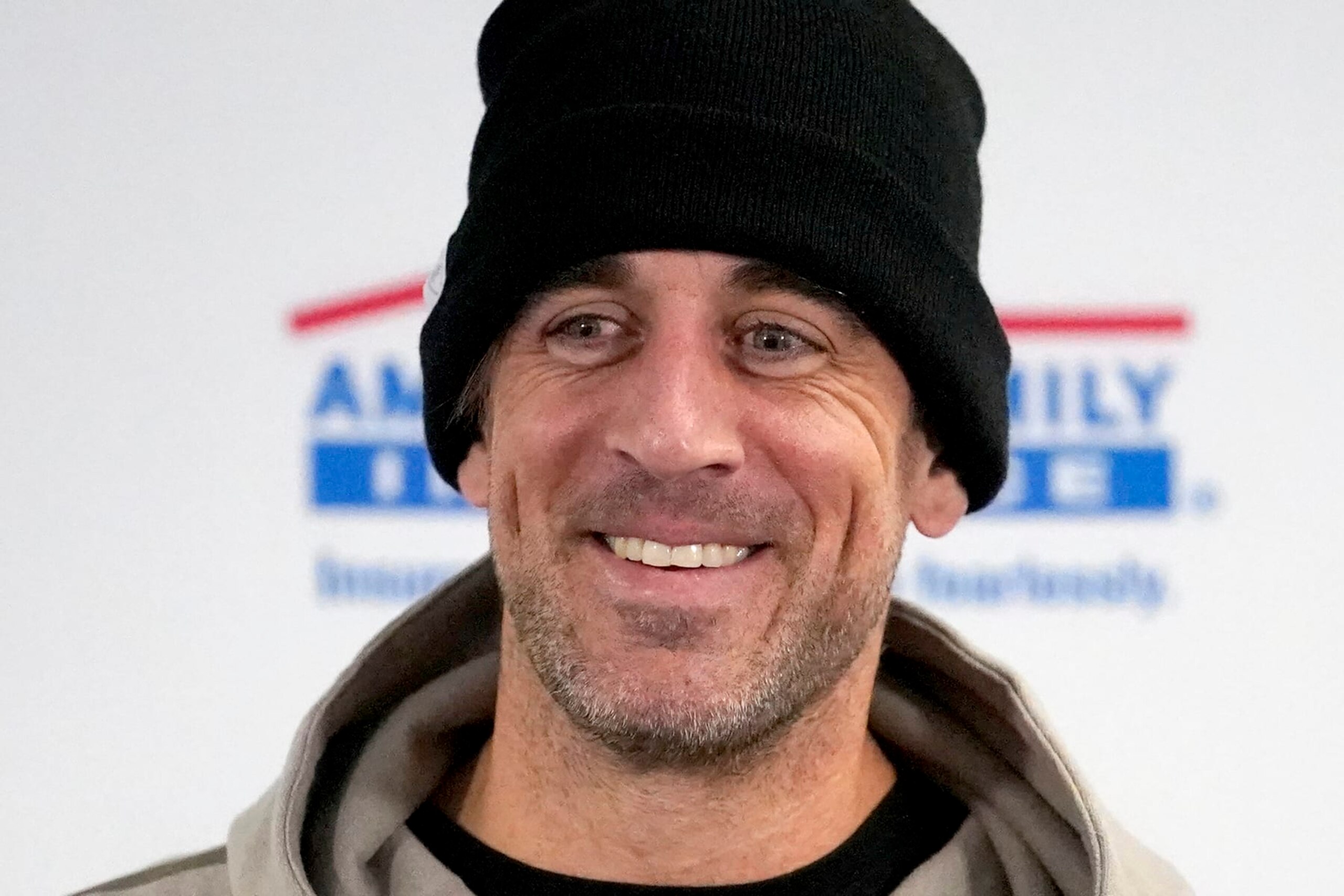 Green Bay Packers' Aaron Rodgers smiles during a news conference after an NFL football game against the Chicago Bears Sunday, Dec. 4, 2022, in Chicago. (AP Photo/Charles Rex Arbogast)