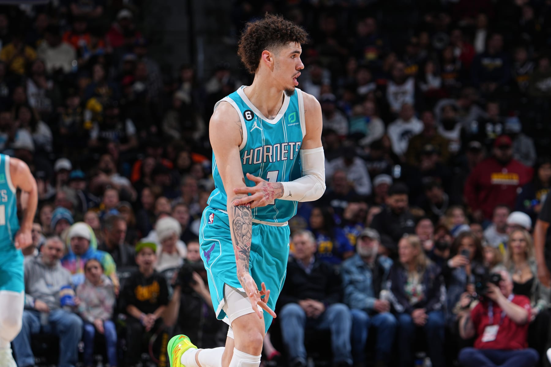 DENVER, CO - DECEMBER 18: LaMelo Ball #1 of the Charlotte Hornets celebrates a three point basket during the game against the Denver Nuggets on December 18, 2022 at the Ball Arena in Denver, Colorado. NOTE TO USER: User expressly acknowledges and agrees that, by downloading and/or using this Photograph, user is consenting to the terms and conditions of the Getty Images License Agreement. Mandatory Copyright Notice: Copyright 2022 NBAE (Photo by Bart Young/NBAE via Getty Images)