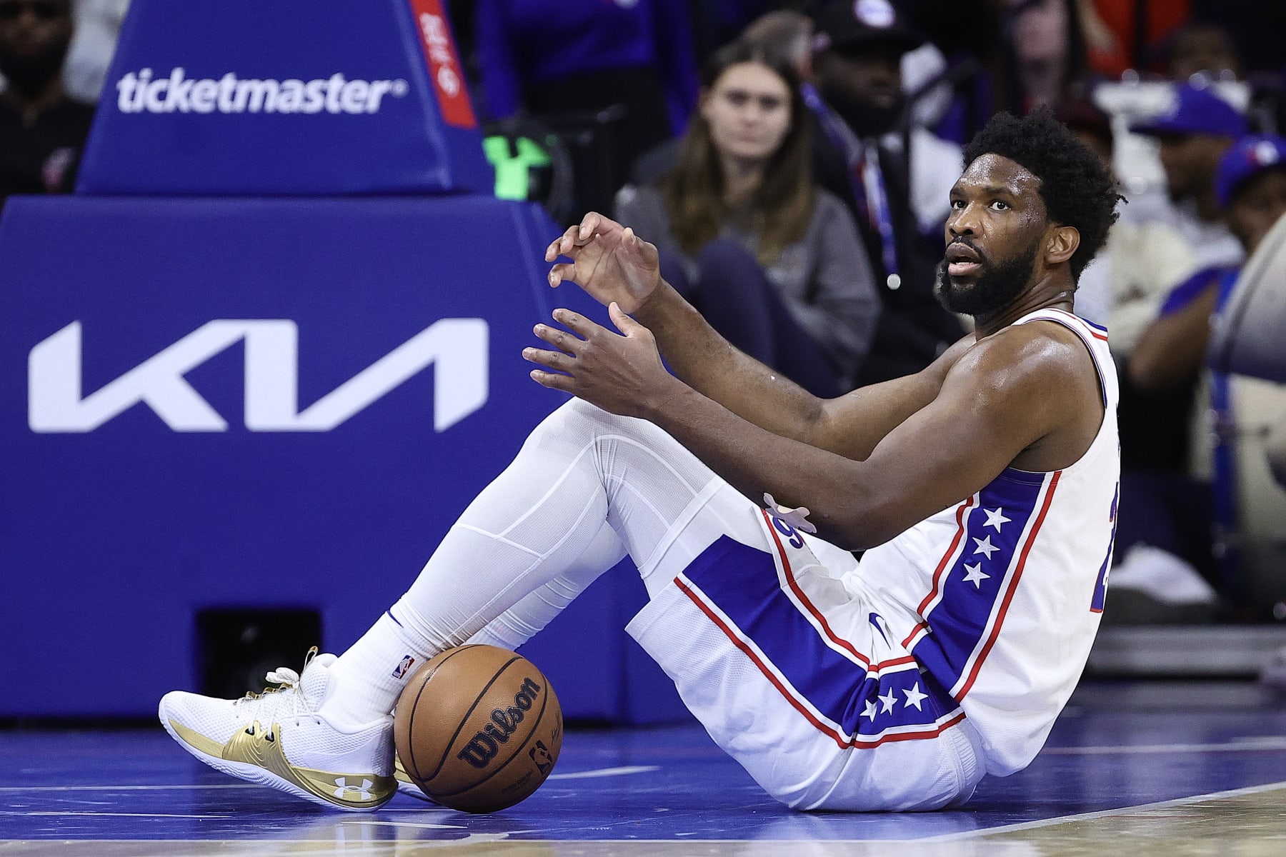 PHILADELPHIA, PENNSYLVANIA - DECEMBER 19: Joel Embiid #21 of the Philadelphia 76ers looks on during the first quarter against the Toronto Raptors at Wells Fargo Center on December 19, 2022 in Philadelphia, Pennsylvania. NOTE TO USER: User expressly acknowledges and agrees that, by downloading and or using this photograph, User is consenting to the terms and conditions of the Getty Images License Agreement. (Photo by Tim Nwachukwu/Getty Images)