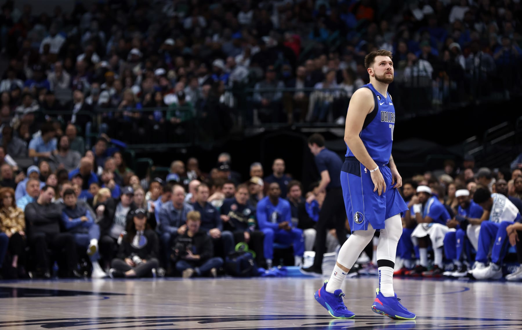 DALLAS, TX - DECEMBER 14: Luka Doncic #77 of the Dallas Mavericks looks on against the Cleveland Cavaliers in the second half at American Airlines Center on December 14, 2022 in Dallas, Texas. NOTE TO USER: User expressly acknowledges and agrees that, by downloading and or using this photograph, User is consenting to the terms and conditions of the Getty Images License Agreement. (Photo by Ron Jenkins/Getty Images)
