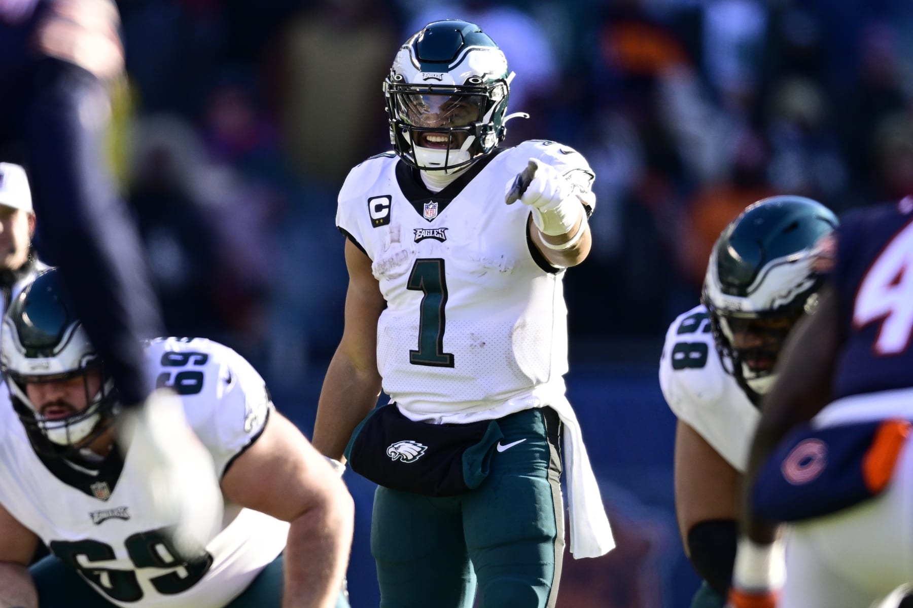 CHICAGO, ILLINOIS - DECEMBER 18: Jalen Hurts #1 of the Philadelphia Eagles directs his team during the third quarter in the game against the Chicago Bears at Soldier Field on December 18, 2022 in Chicago, Illinois. (Photo by Quinn Harris/Getty Images)