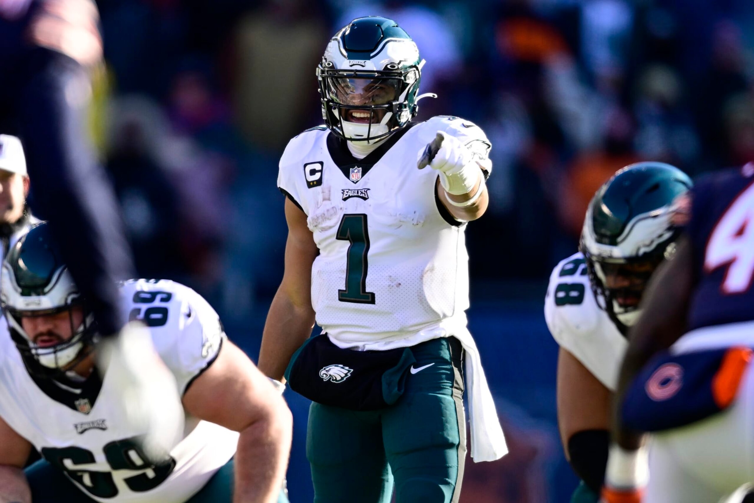 CHICAGO, ILLINOIS - DECEMBER 18: Jalen Hurts #1 of the Philadelphia Eagles directs his team during the third quarter in the game against the Chicago Bears at Soldier Field on December 18, 2022 in Chicago, Illinois. (Photo by Quinn Harris/Getty Images)