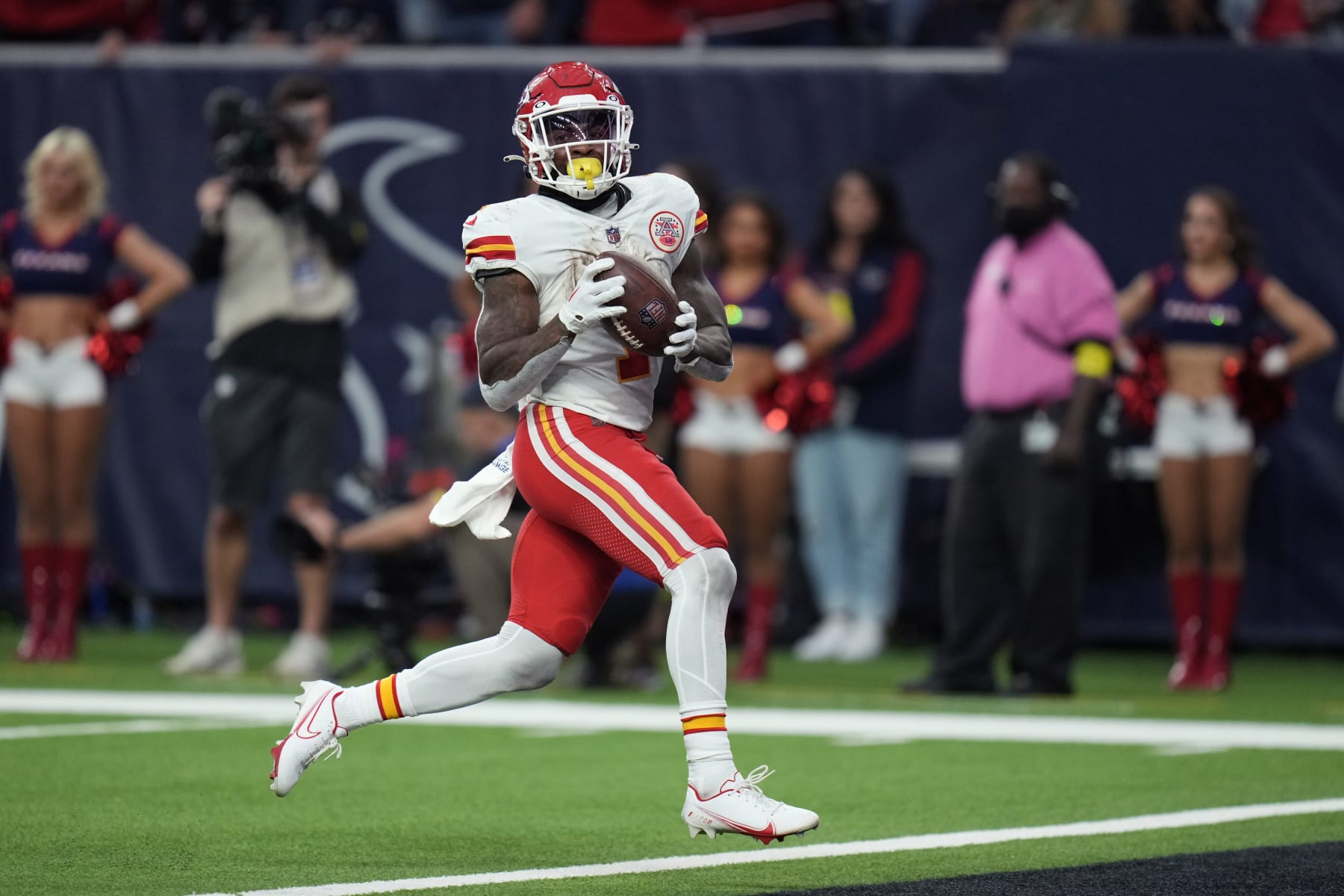 Kansas City Chiefs running back Jerick McKinnon (1) runs for a touchdown against the Houston Texans during overtime in an NFL football game Sunday, Dec. 18, 2022, in Houston. (AP Photo/Eric Christian Smith)