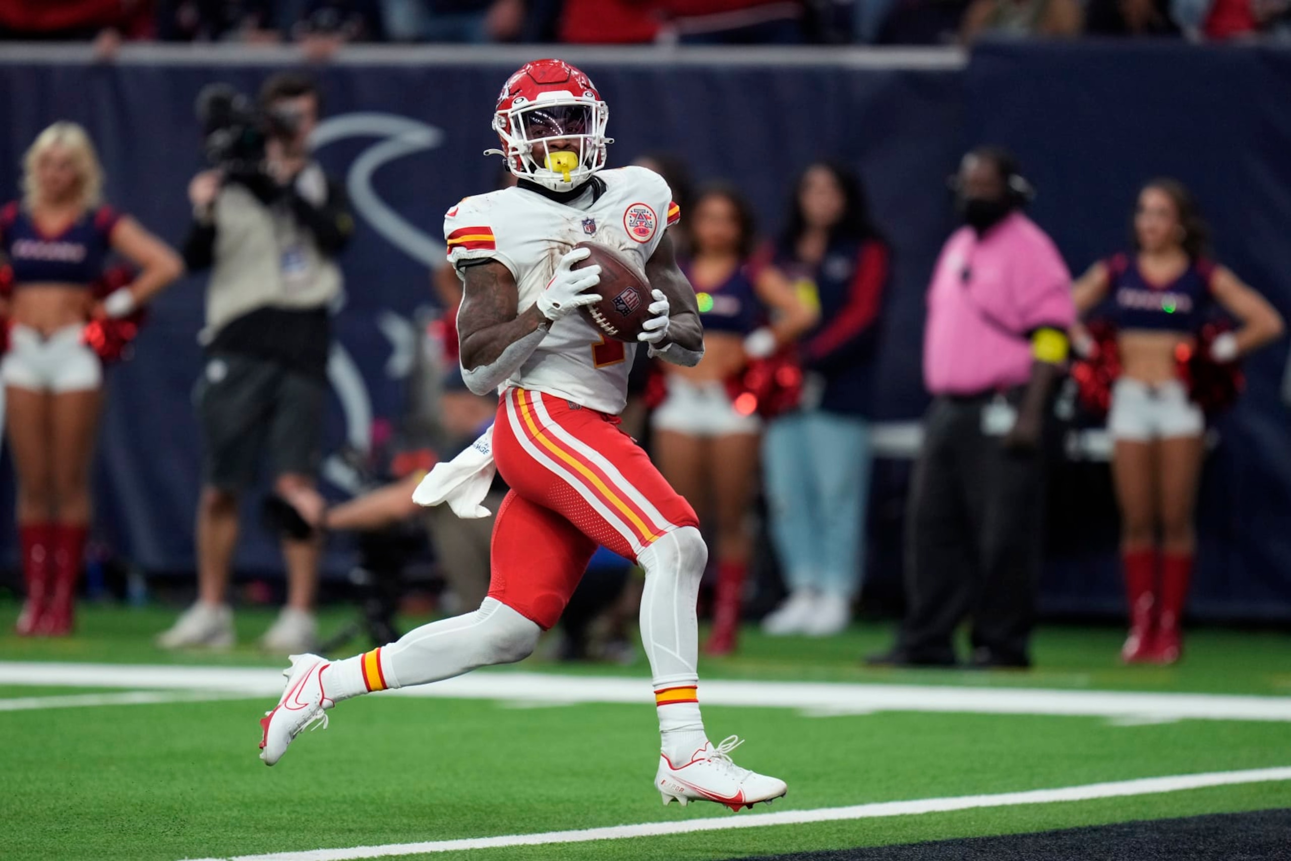 Kansas City Chiefs running back Jerick McKinnon (1) runs for a touchdown against the Houston Texans during overtime in an NFL football game Sunday, Dec. 18, 2022, in Houston. (AP Photo/Eric Christian Smith)